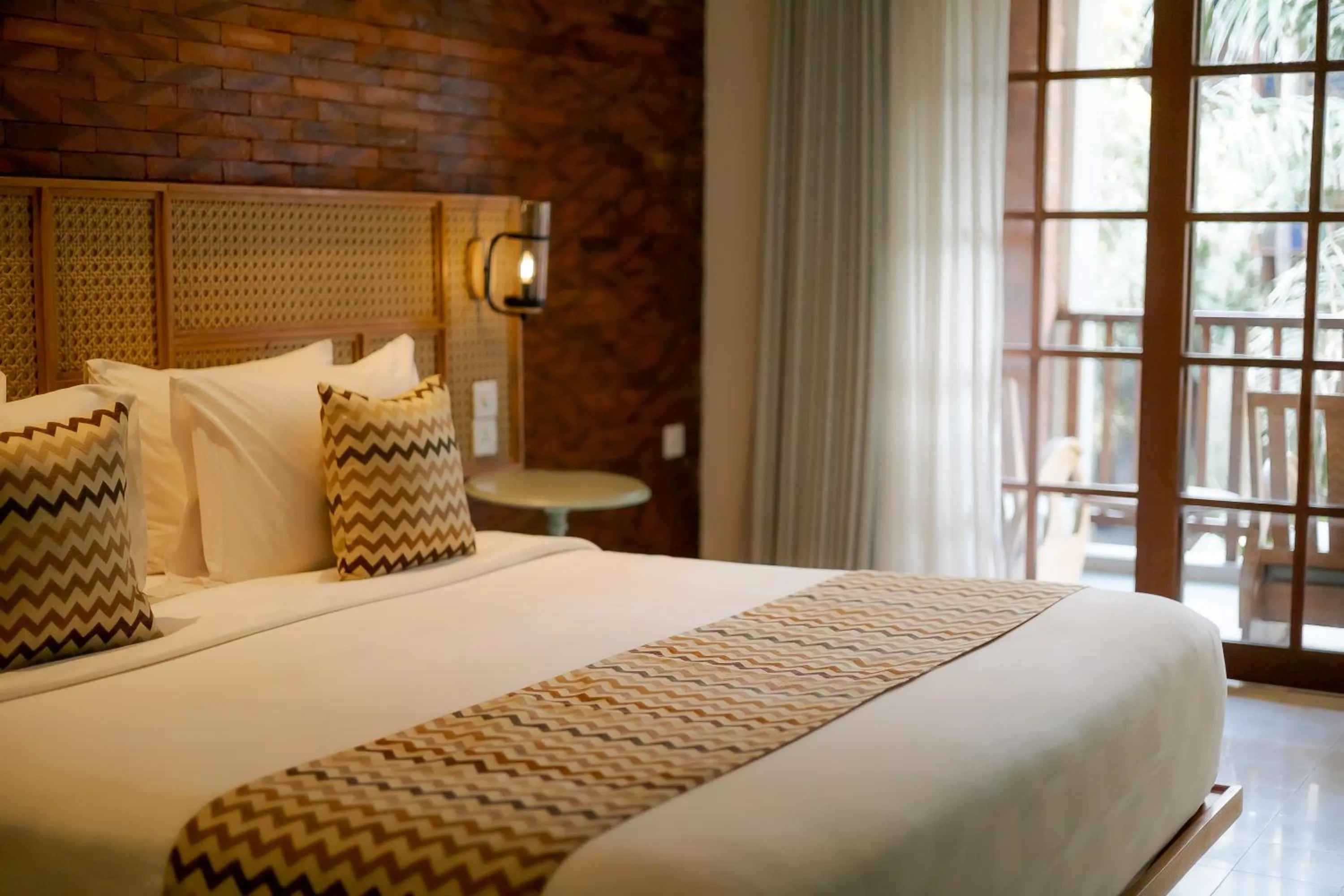 Bed in Fourteen Roses Boutique Hotel, Kuta