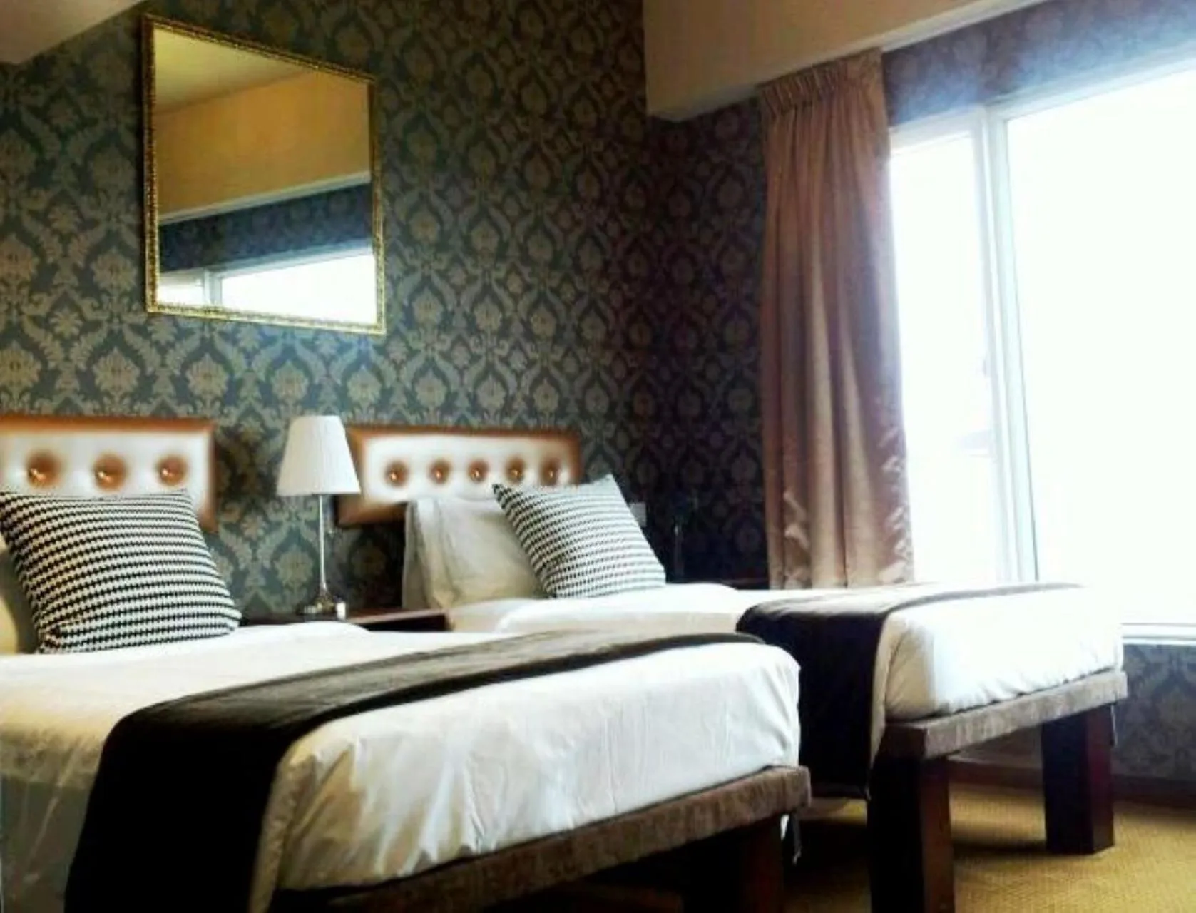 Photo of the whole room, Bed in Ramada Grand Tsim Sha Tsui
