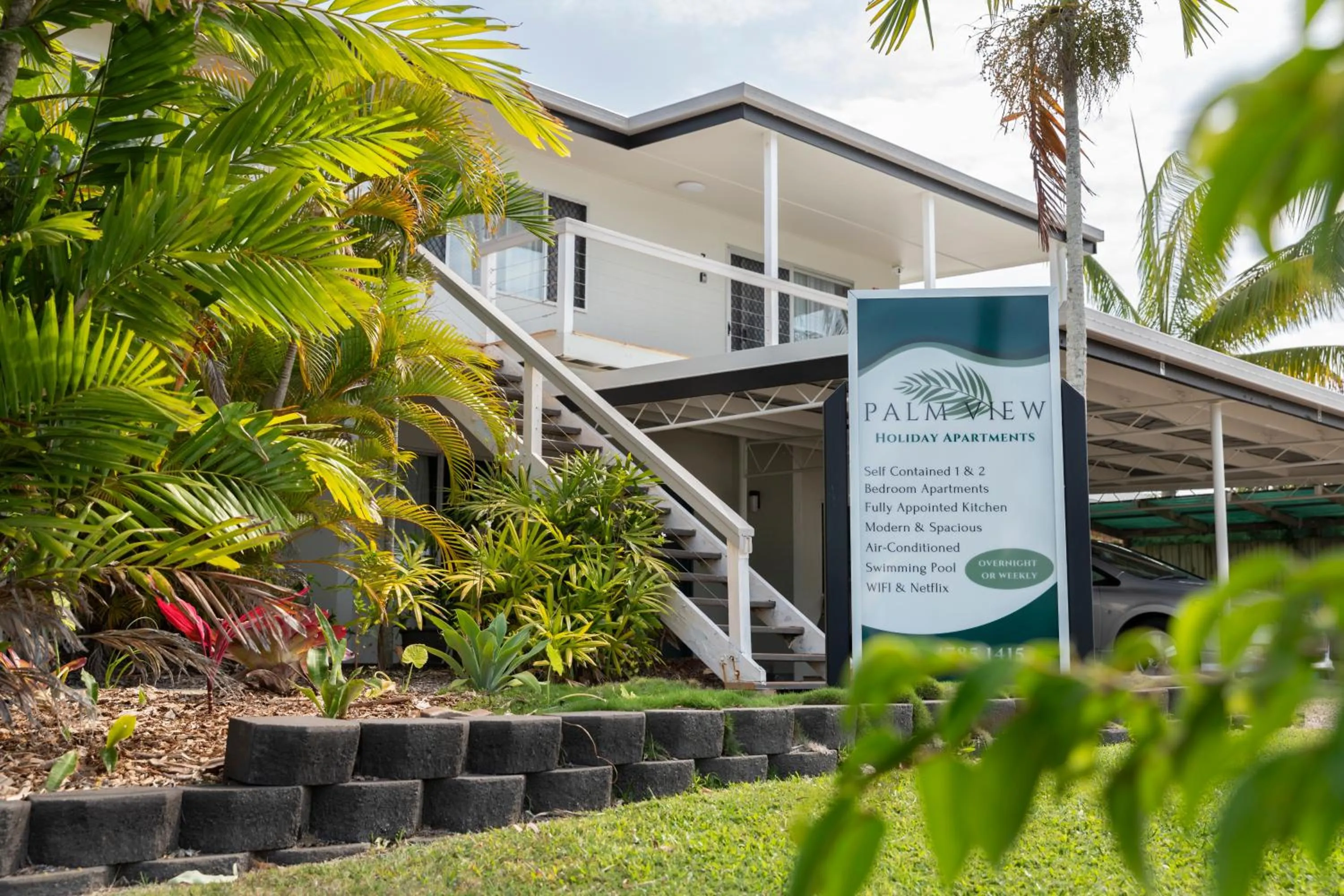 Property logo or sign in Palm View Holiday Apartments