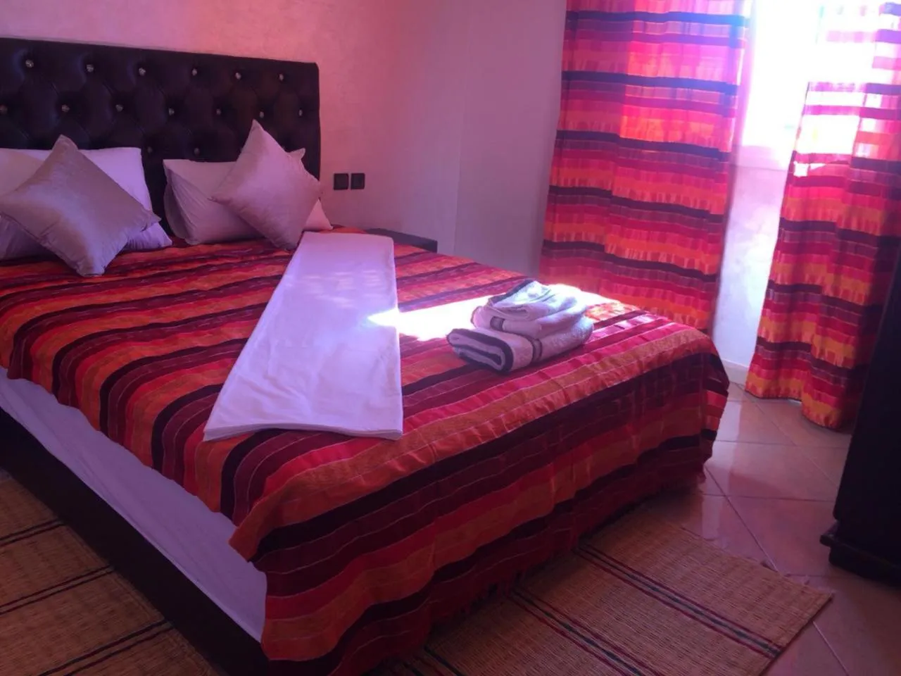 Bed in ITRANE GUEST HOUSE