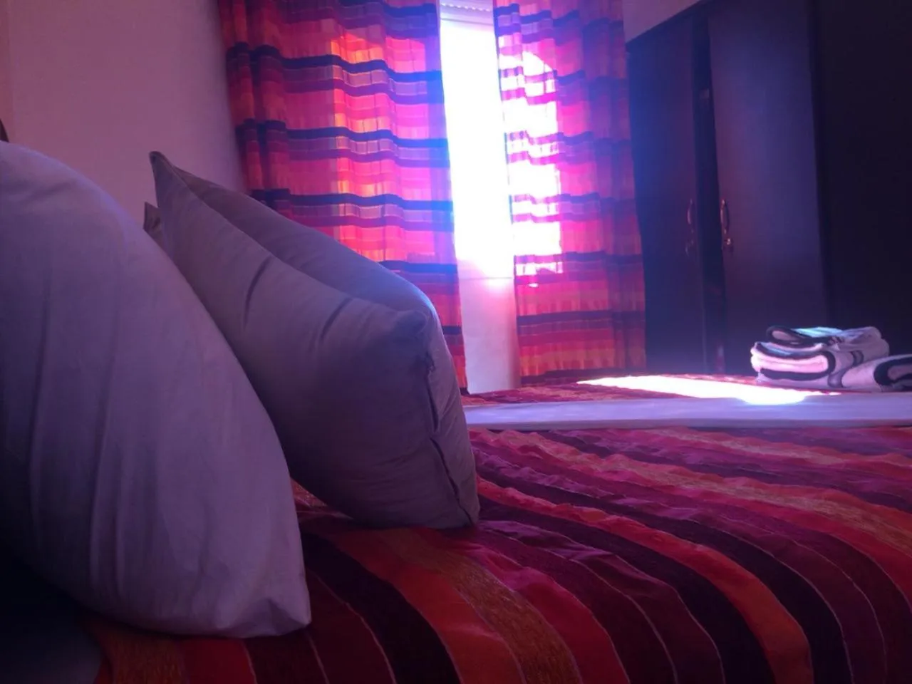 Bed in ITRANE GUEST HOUSE