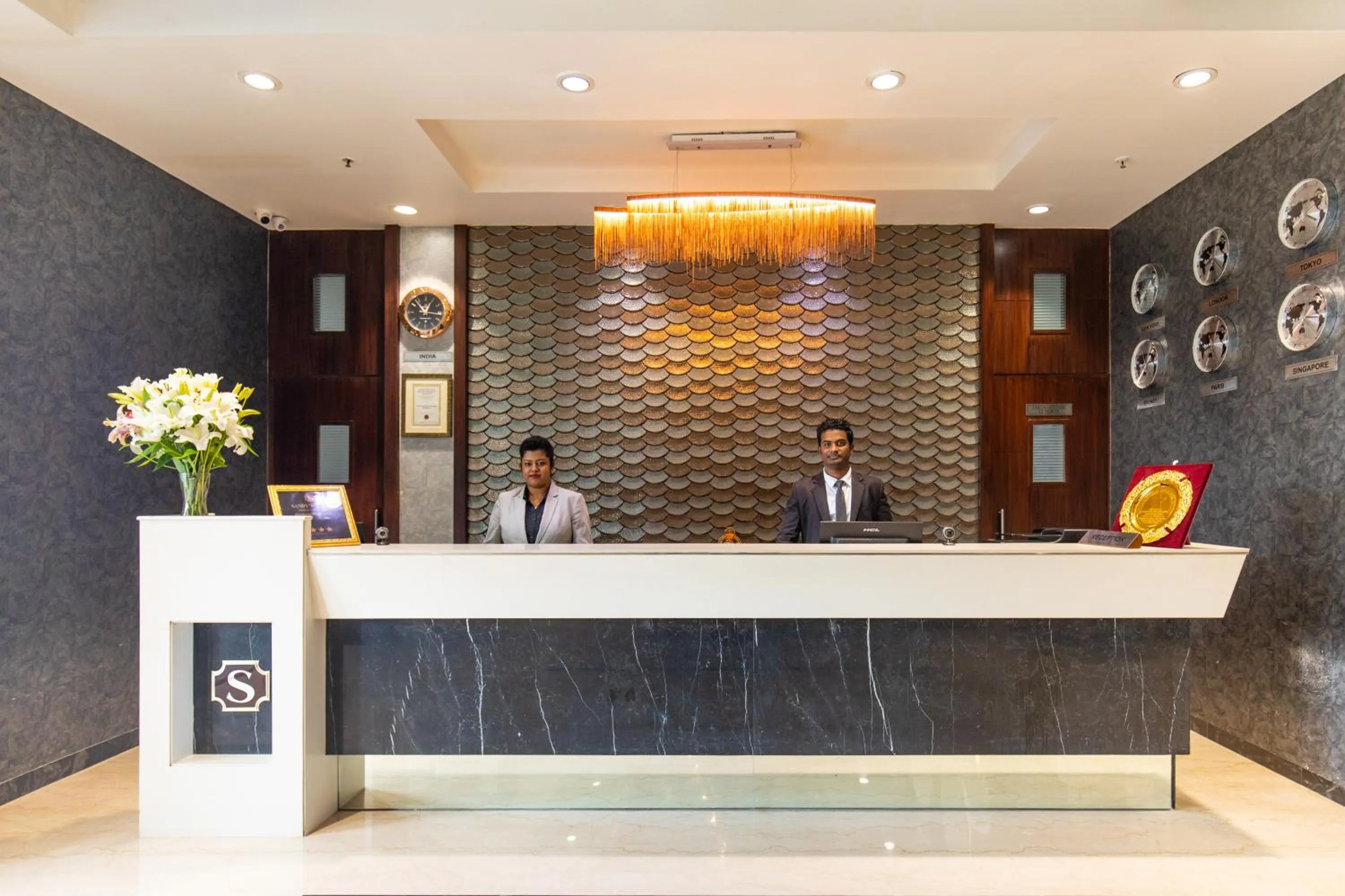 Lobby or reception in Hotel Sandy's Tower