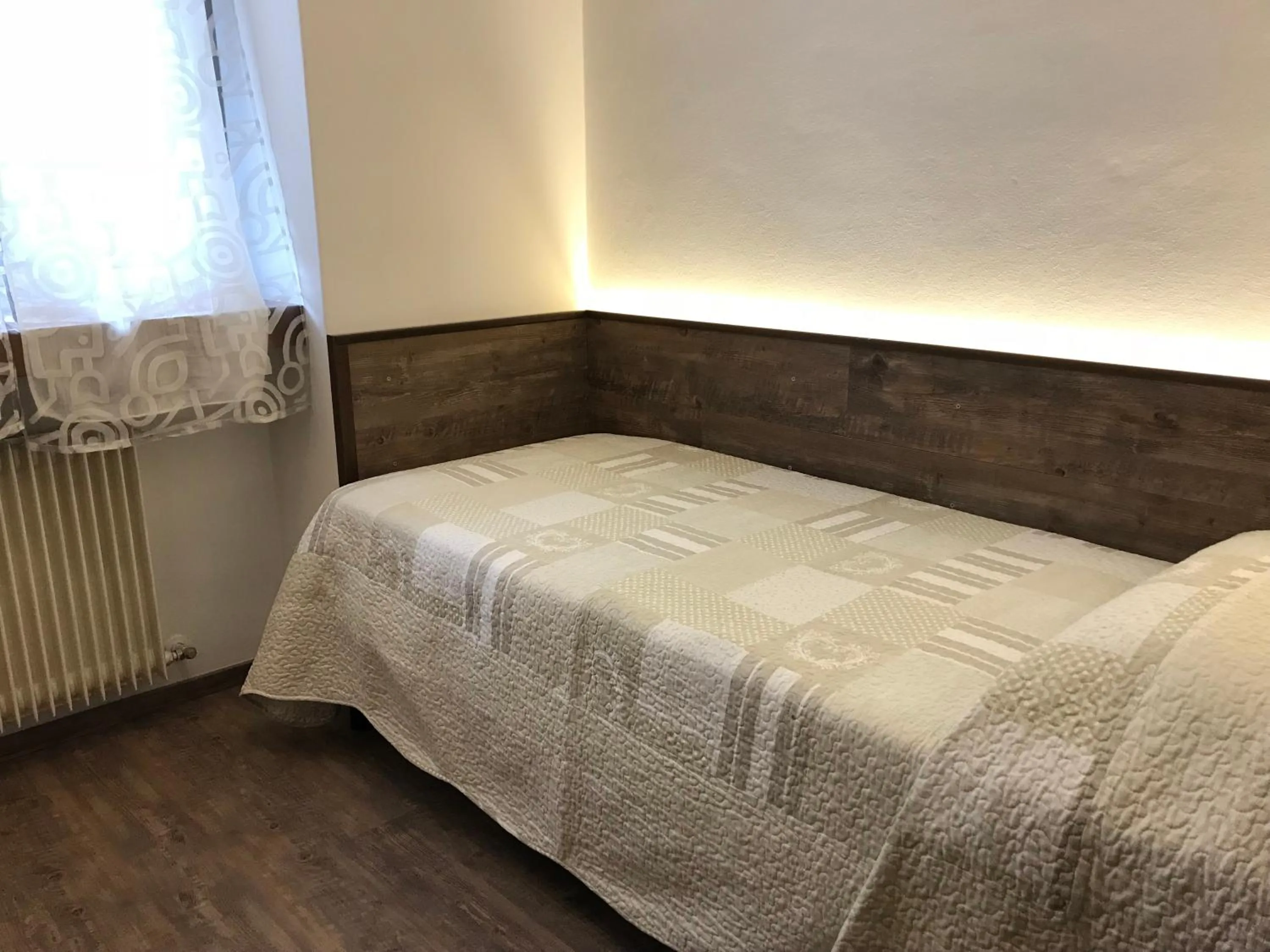 Bed in Le Servite Apartments