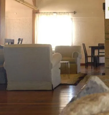 Communal lounge/ TV room in Hotel de Las Nubes