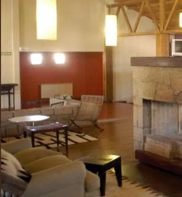 Communal lounge/ TV room in Hotel de Las Nubes