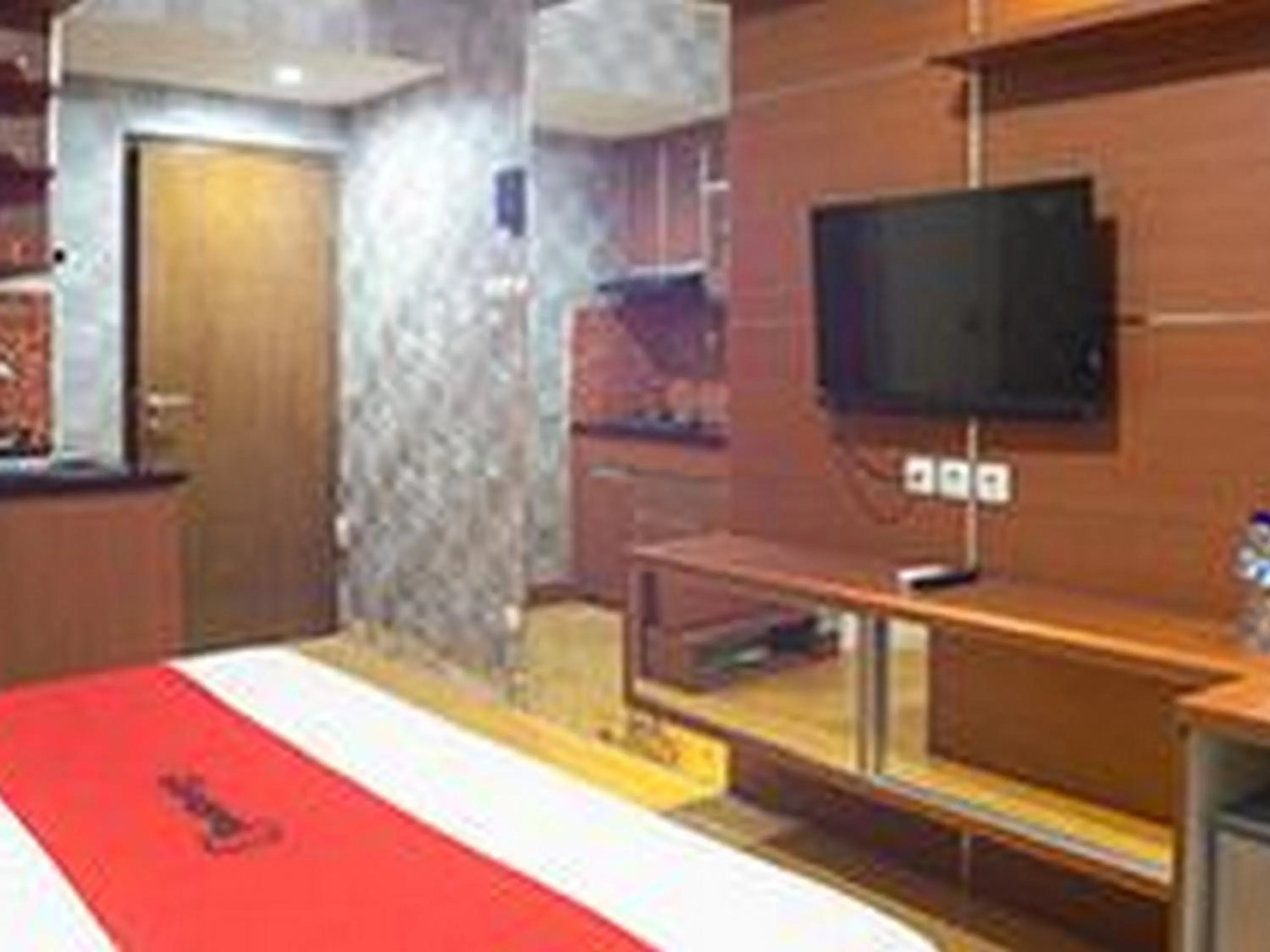 Bedroom, Bed in RedDoorz Apartment at Bogor Valley