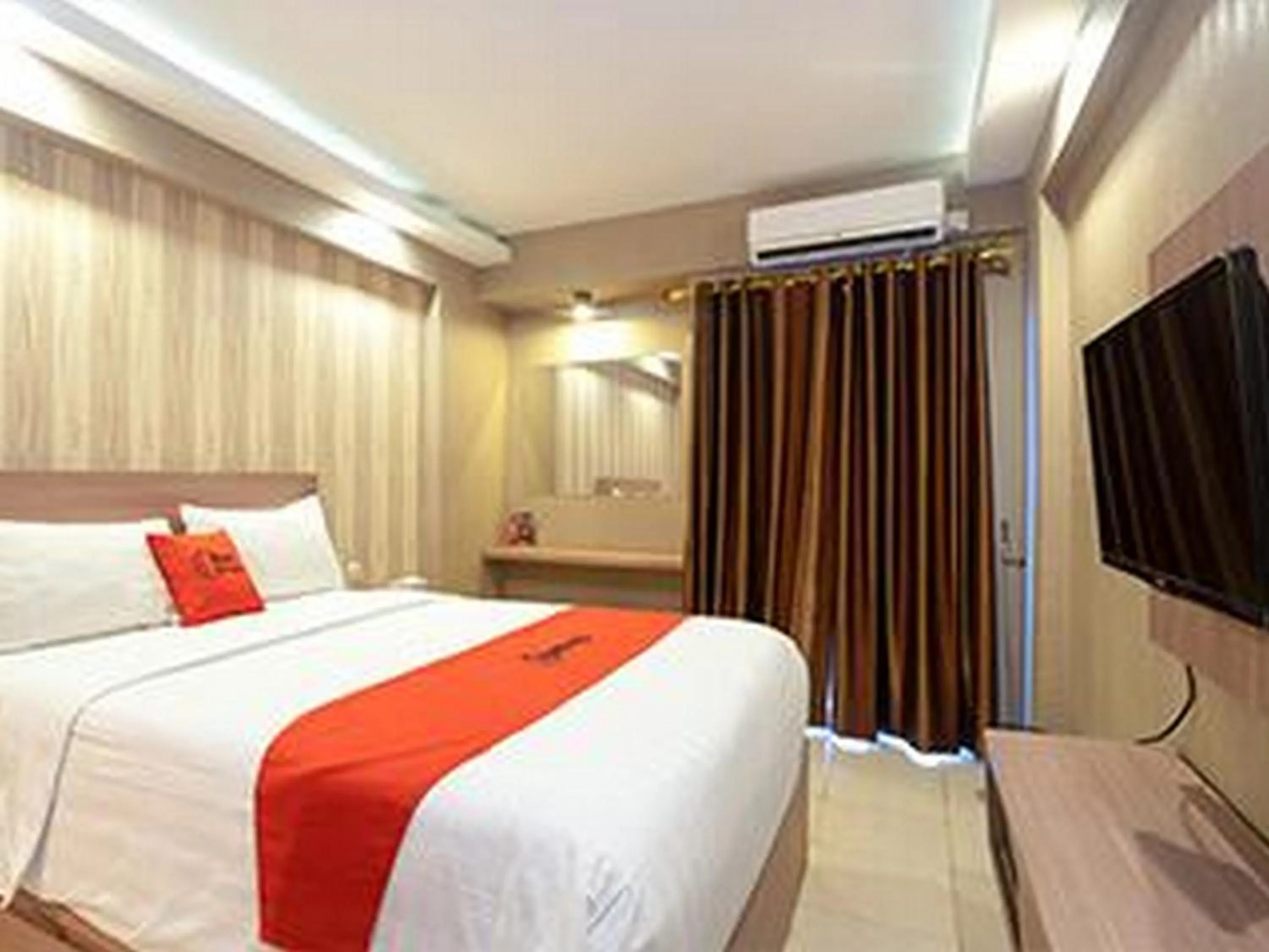 Bedroom, Bed in RedDoorz Apartment at Bogor Valley