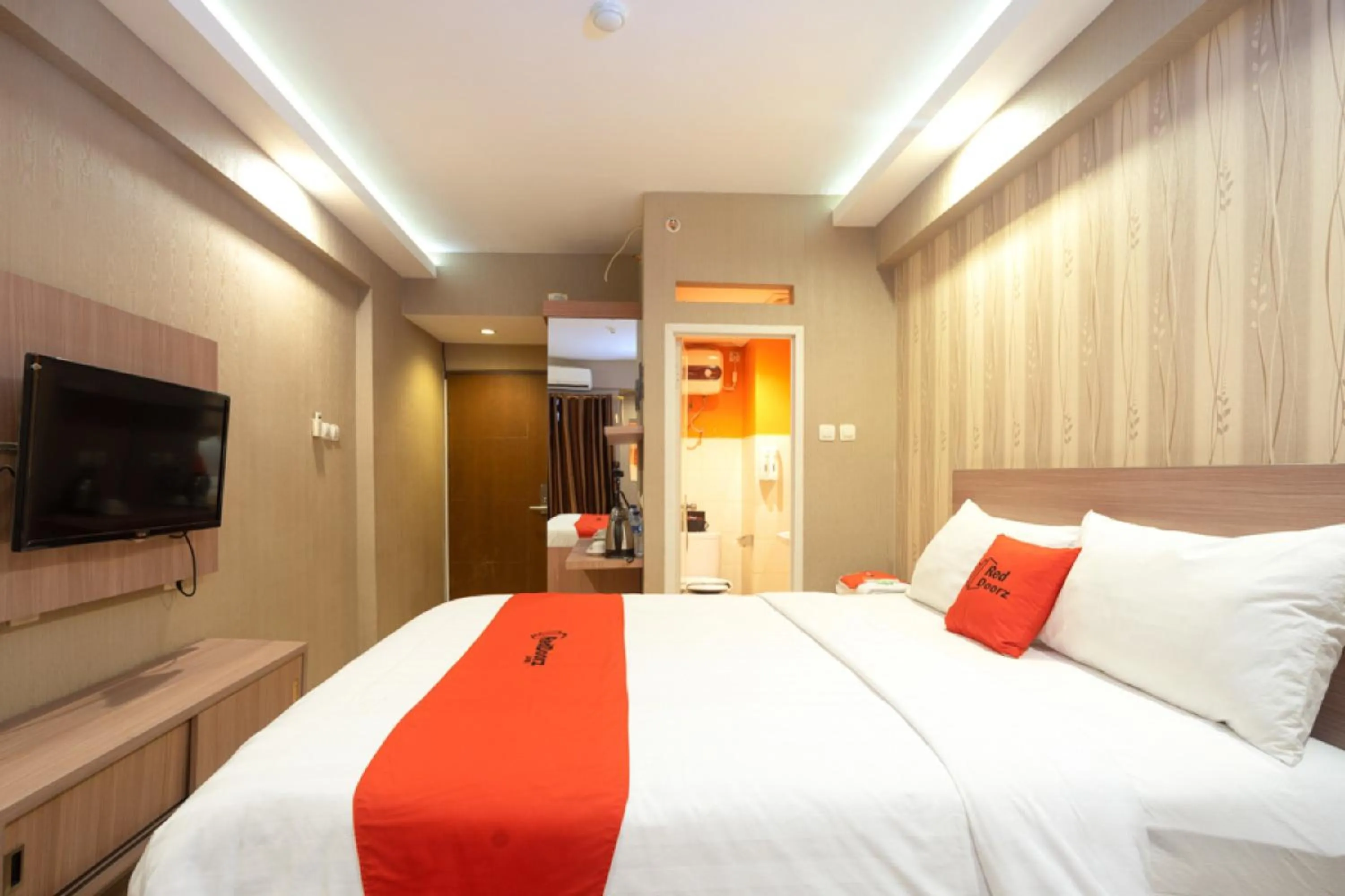 Bedroom, Bed in RedDoorz Apartment at Bogor Valley