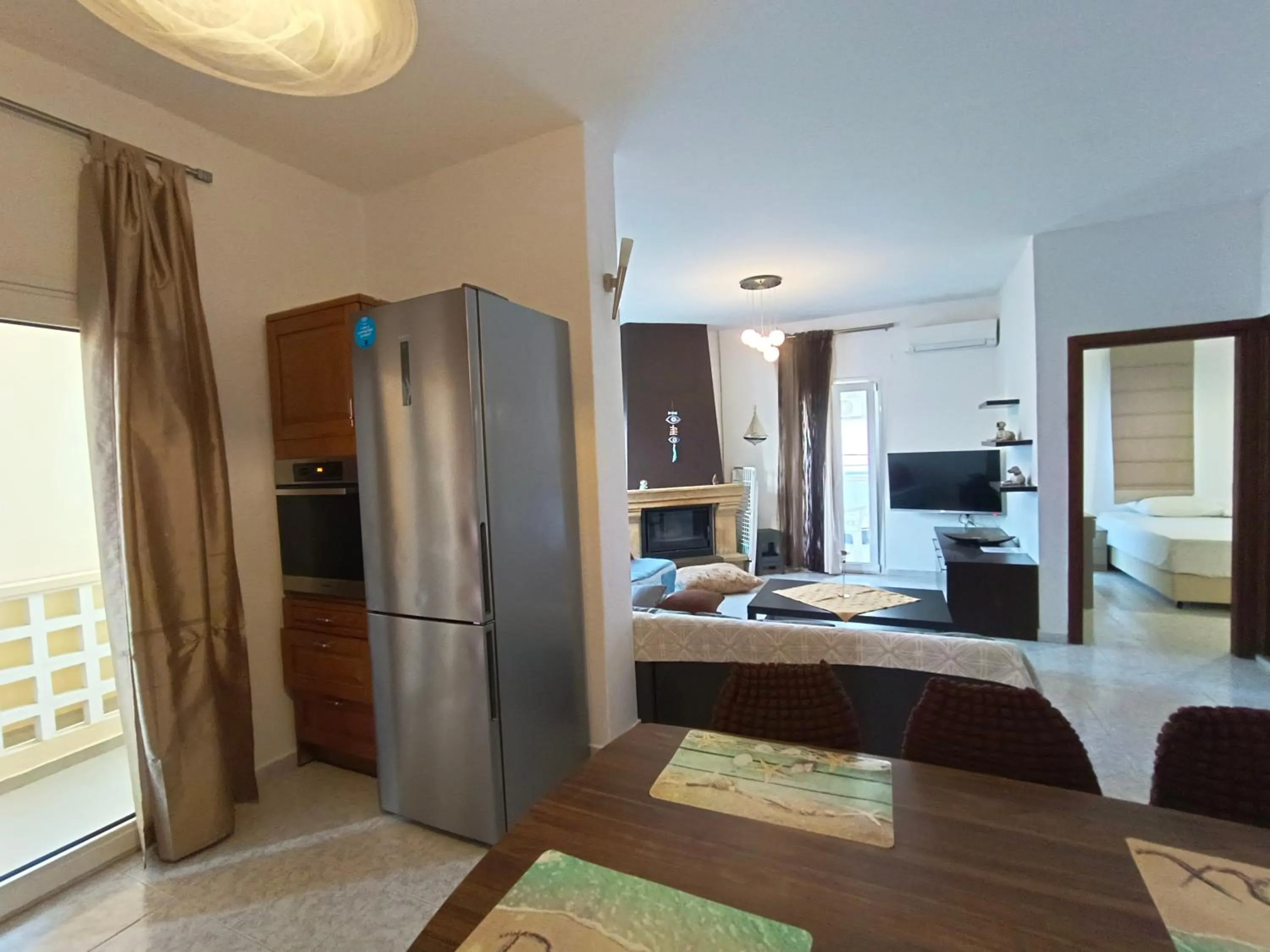 Living room, Bed in Albatross Apartments