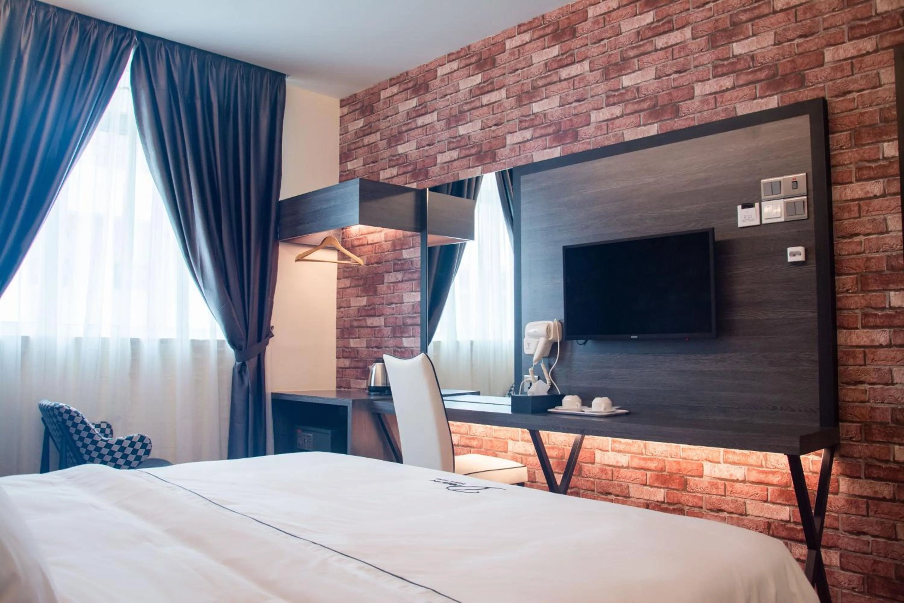 Bed in DREAM LUXURY HOTEL