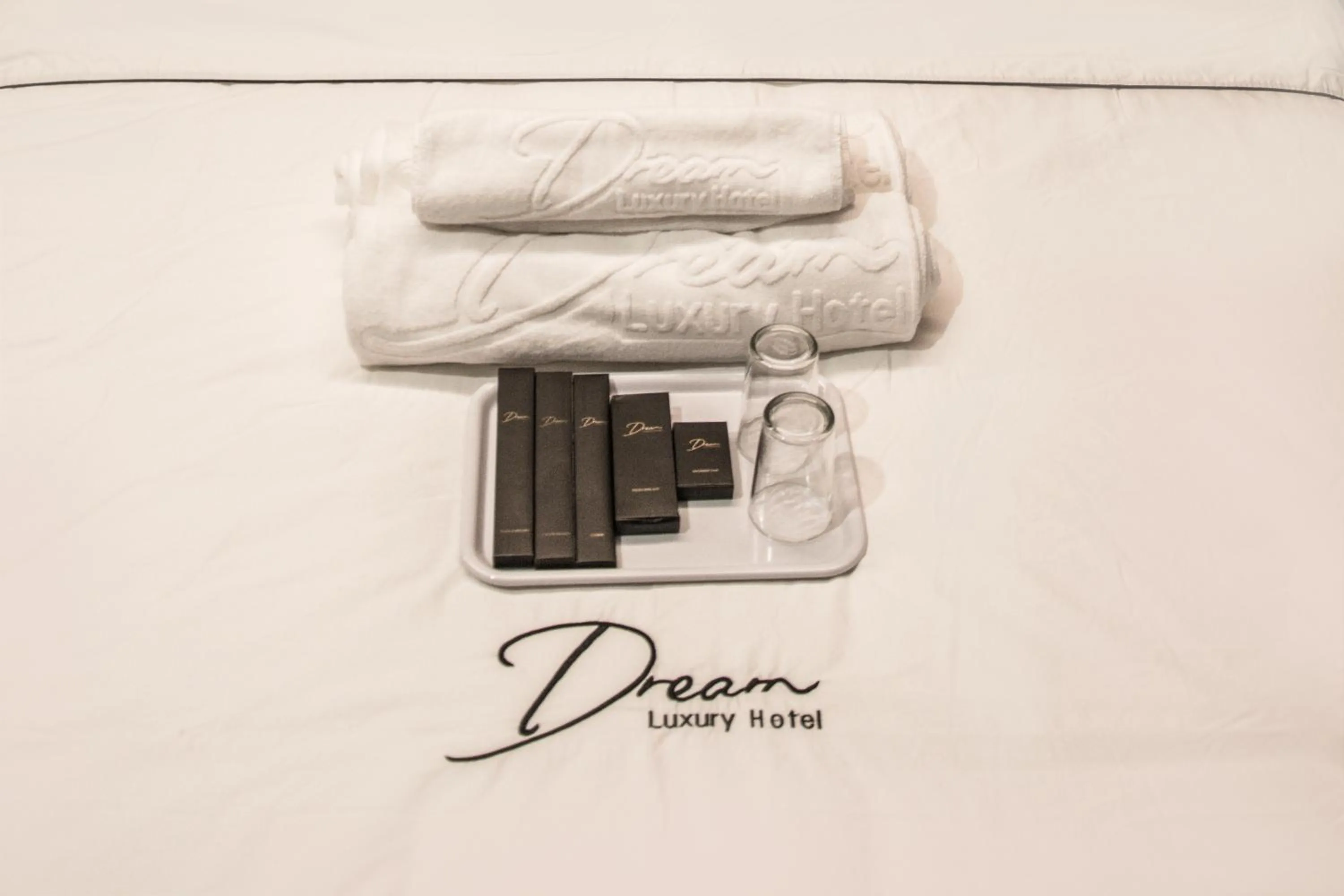 Bed in DREAM LUXURY HOTEL