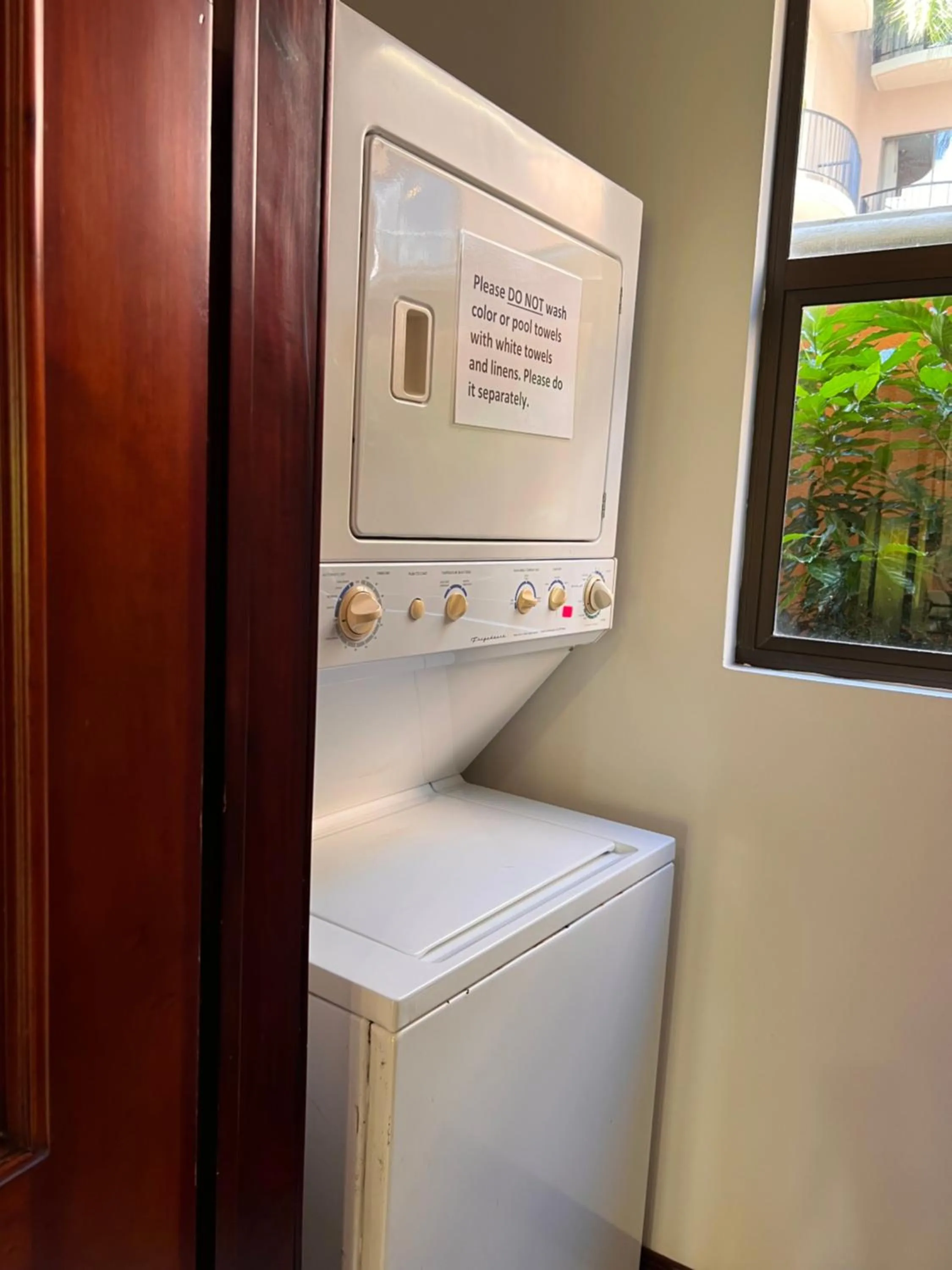 washing machine in Monte Carlo Luxury Condominiums
