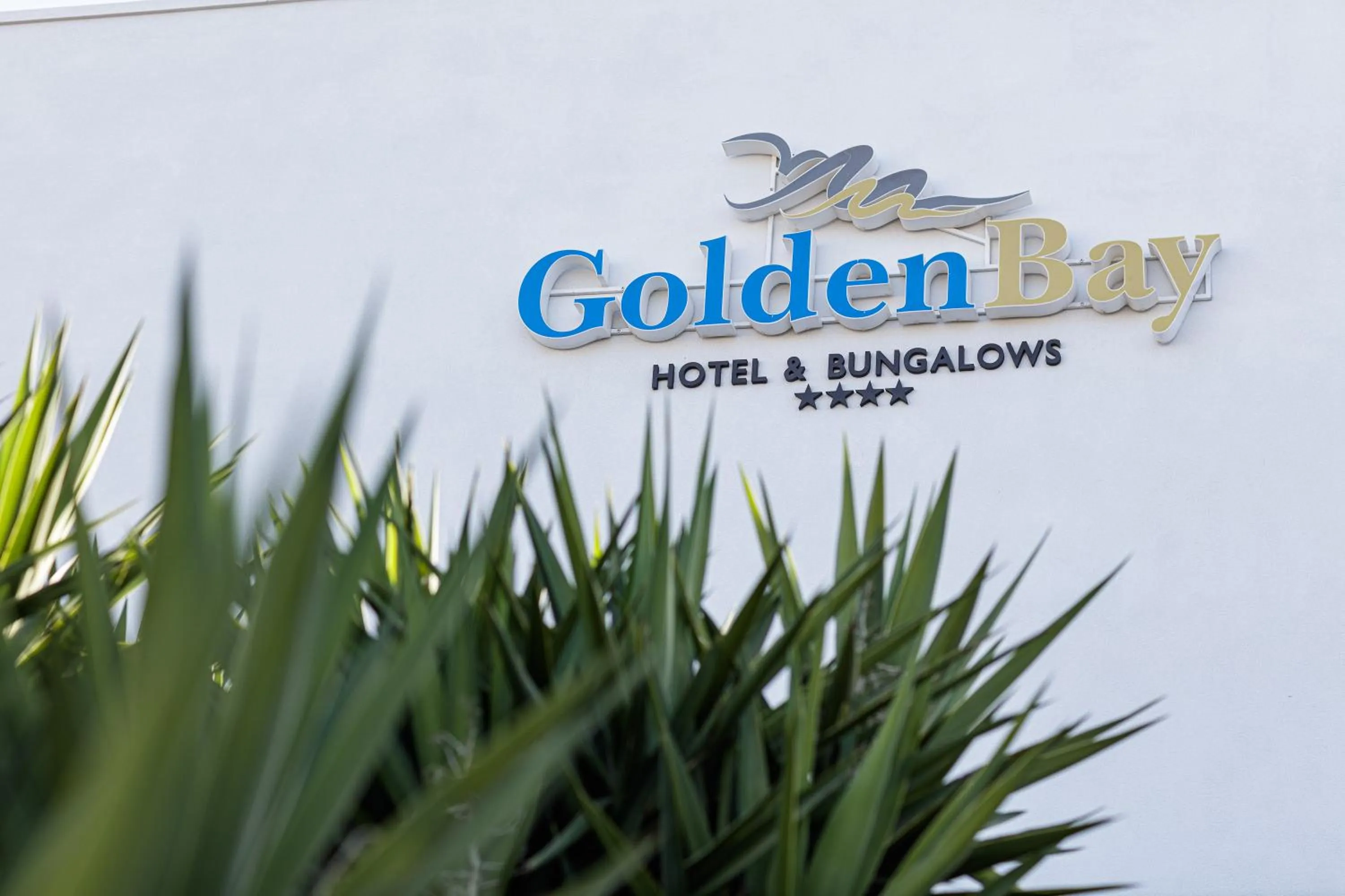 Property logo or sign in Golden Bay Boutique Hotel & Bungalows