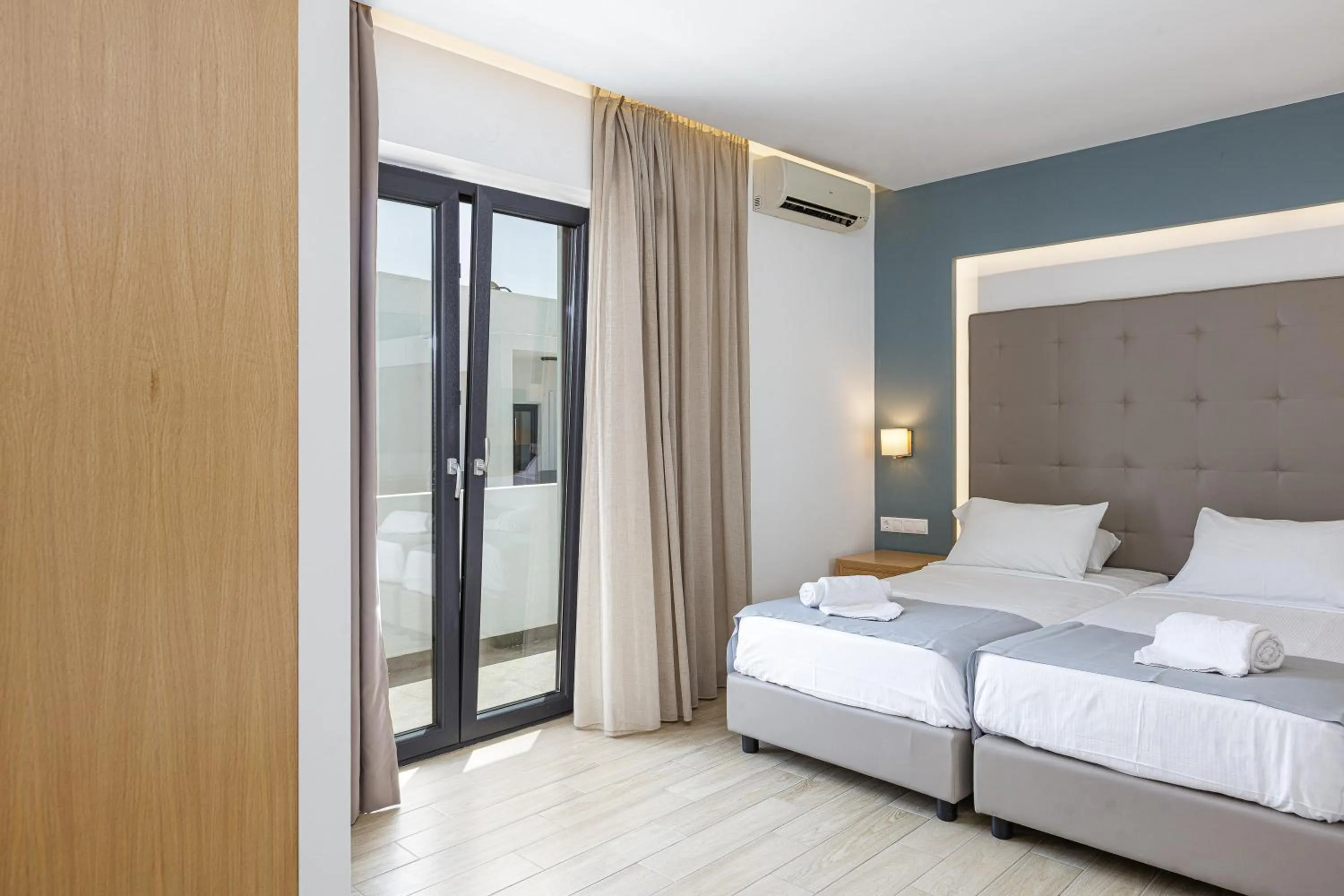 Bed in Golden Bay Boutique Hotel & Bungalows