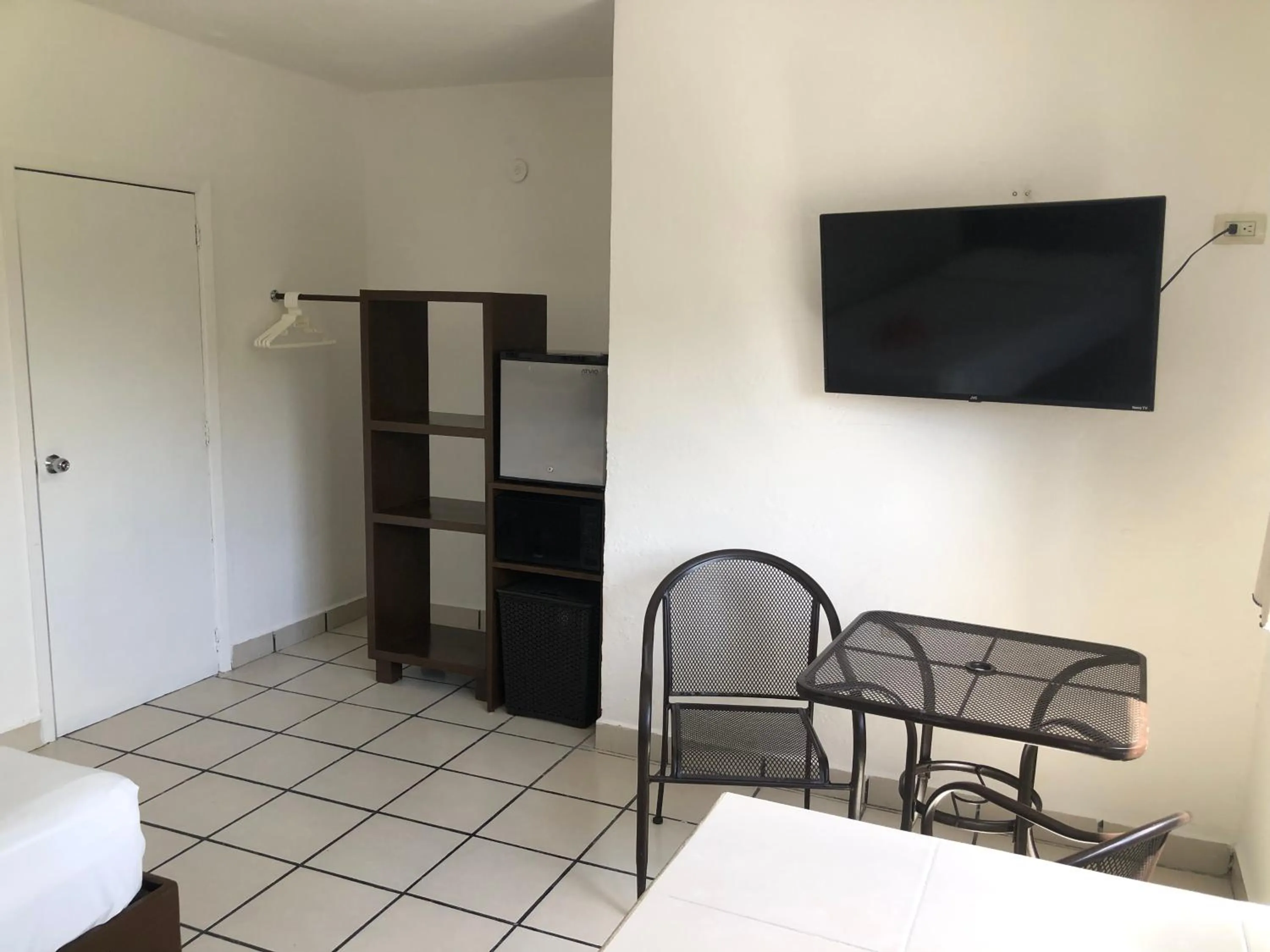 Photo of the whole room, Bed in Caribo Cozumel