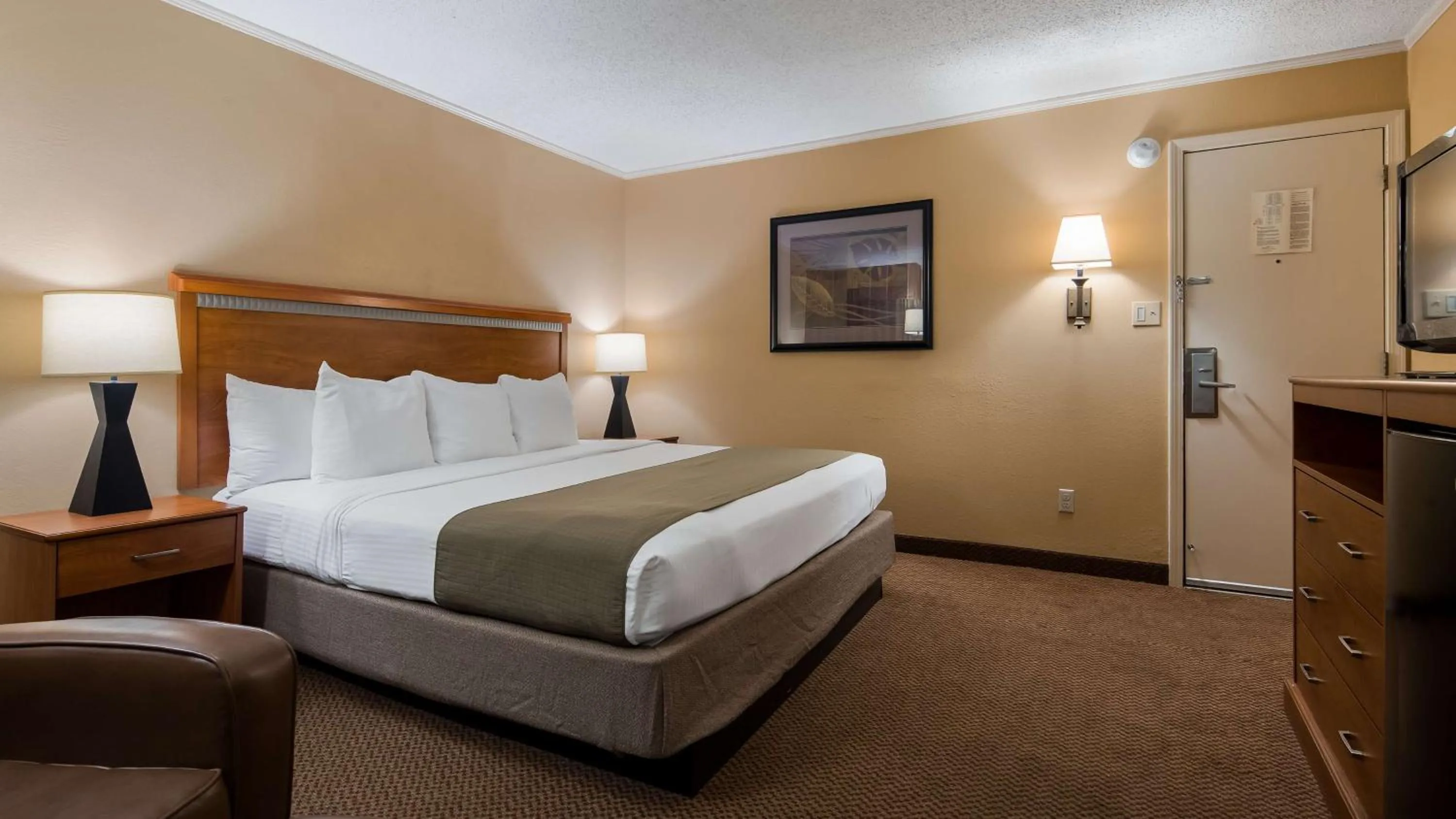 Bathroom, Bed in SureStay Plus by Best Western Covington