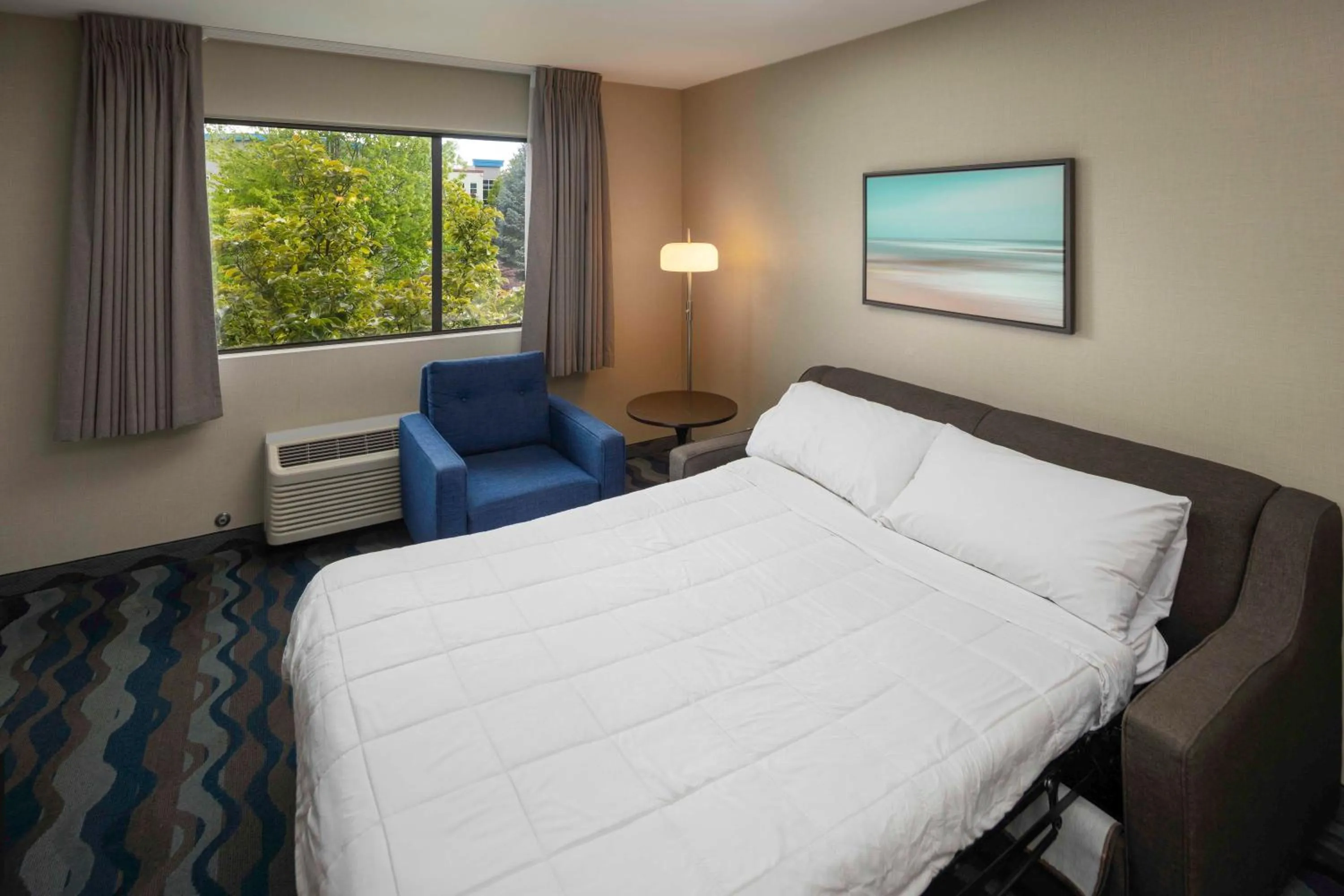 Bed in Accent Inns Burnaby
