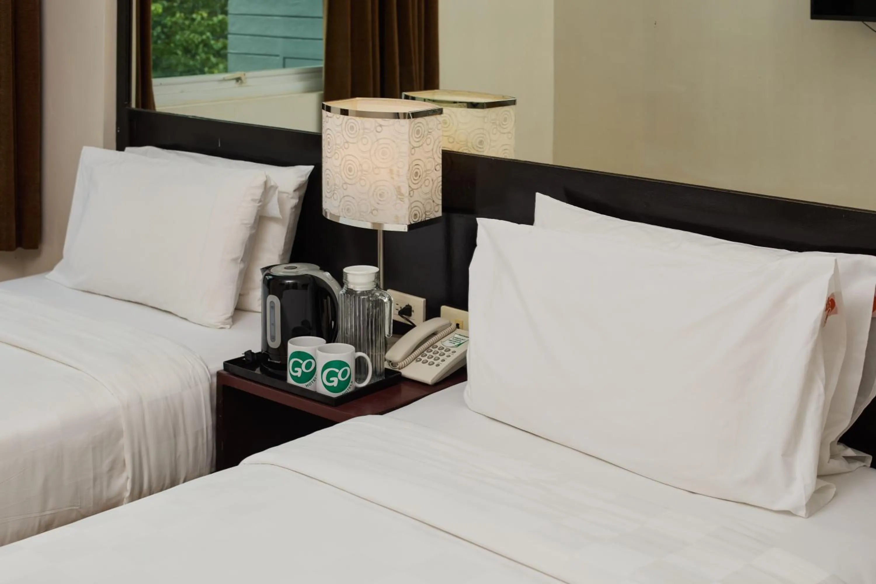 Bedroom, Bed in Go Hotels Puerto Princesa