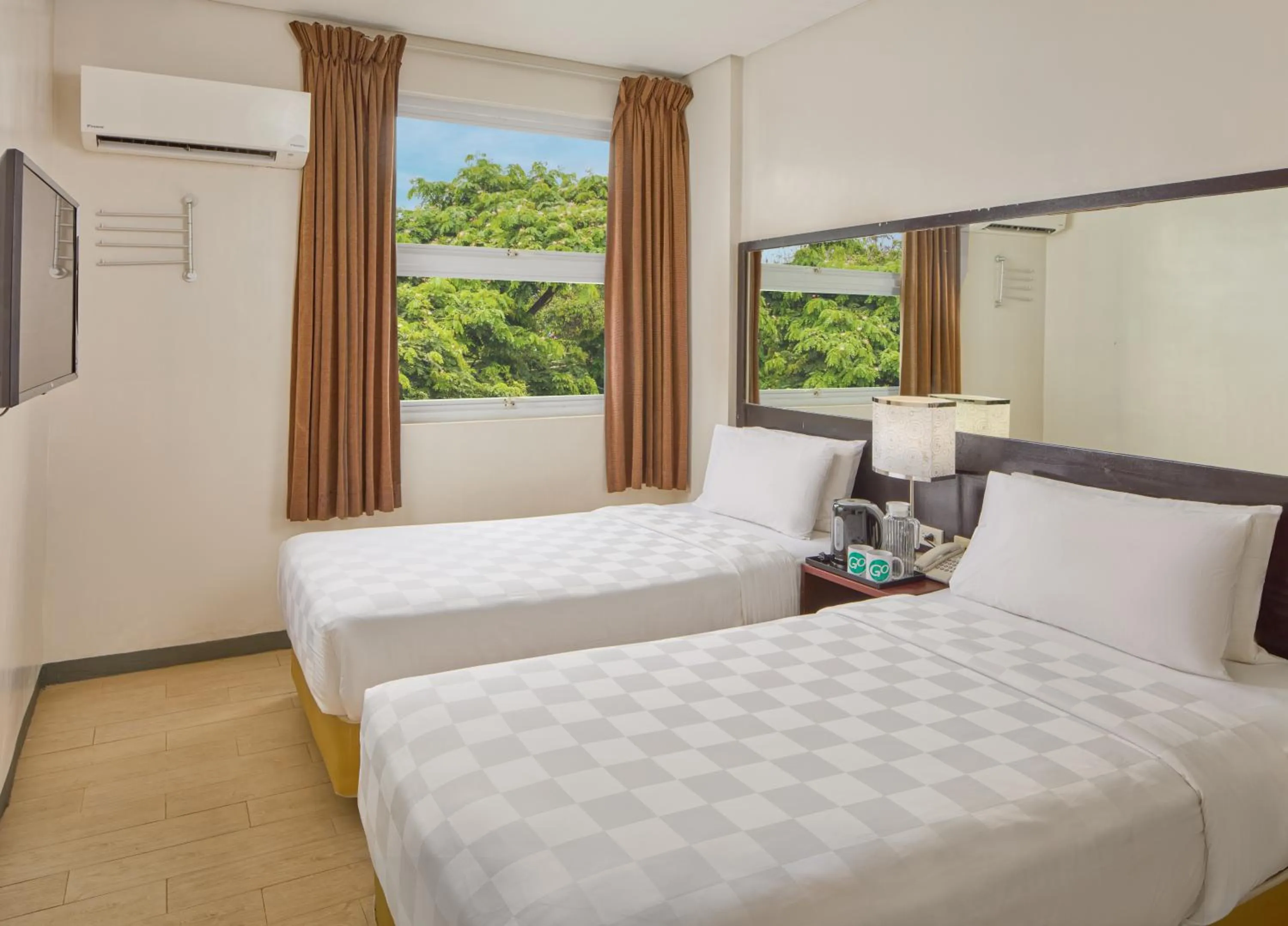 Bed in Go Hotels Puerto Princesa