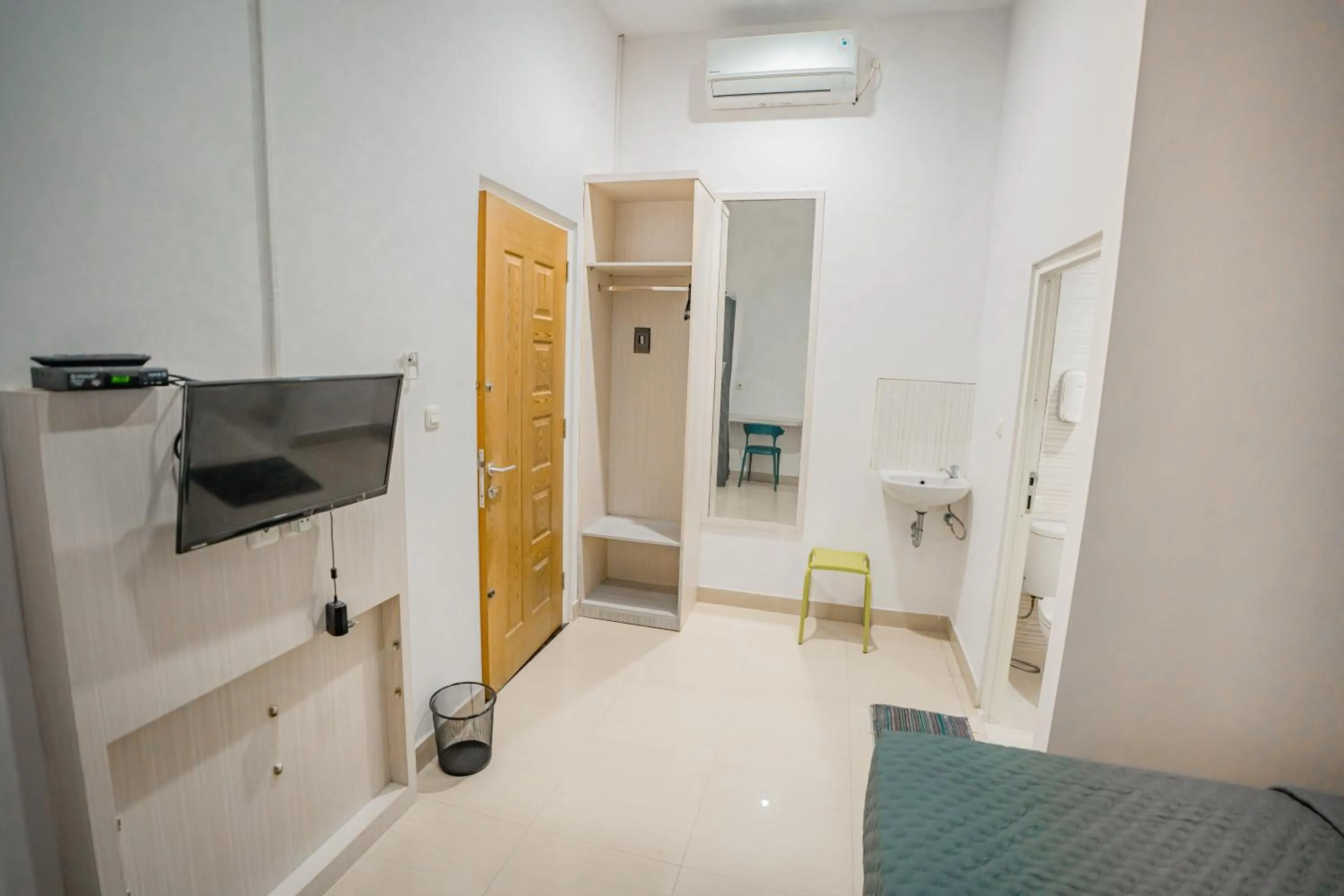 Bedroom in Hotel Pratisarawirya by The Loka