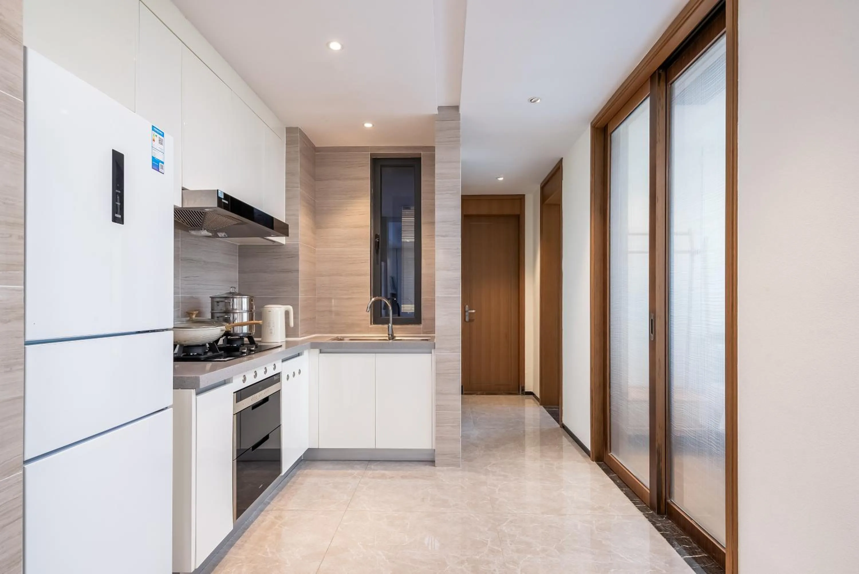 Kitchen or kitchenette in Elnob Seaview Aparthotel Hai Tang Bay Sanya