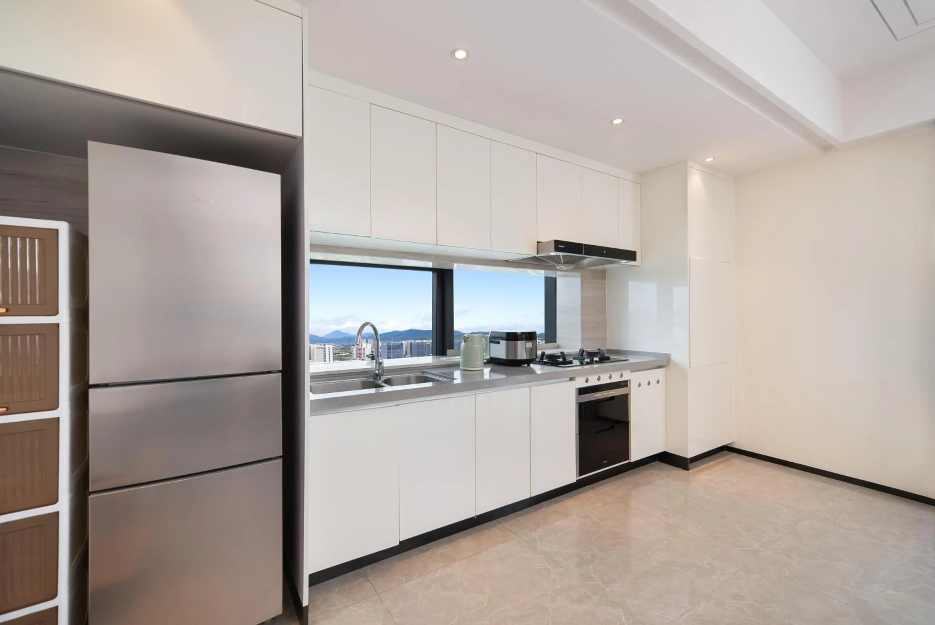 Kitchen or kitchenette in Elnob Seaview Aparthotel Hai Tang Bay Sanya