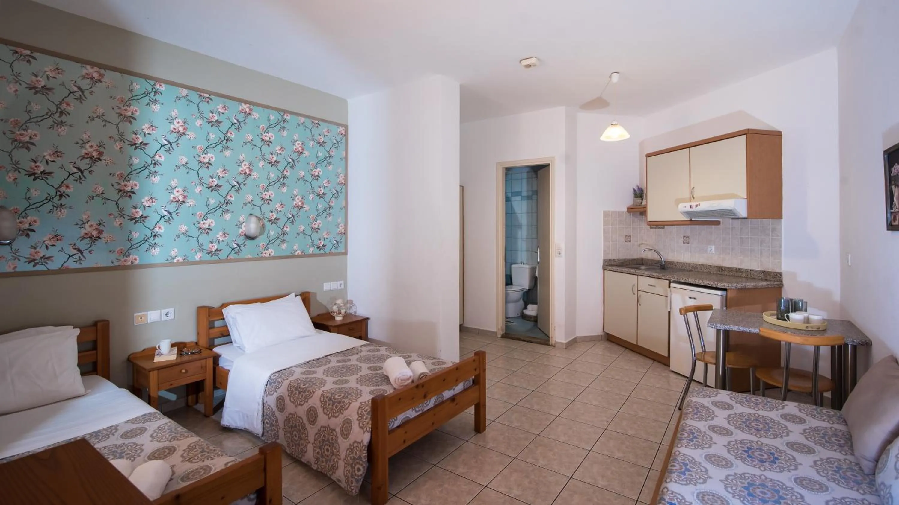 Kitchen or kitchenette, Bed in Sarpidon Apartments