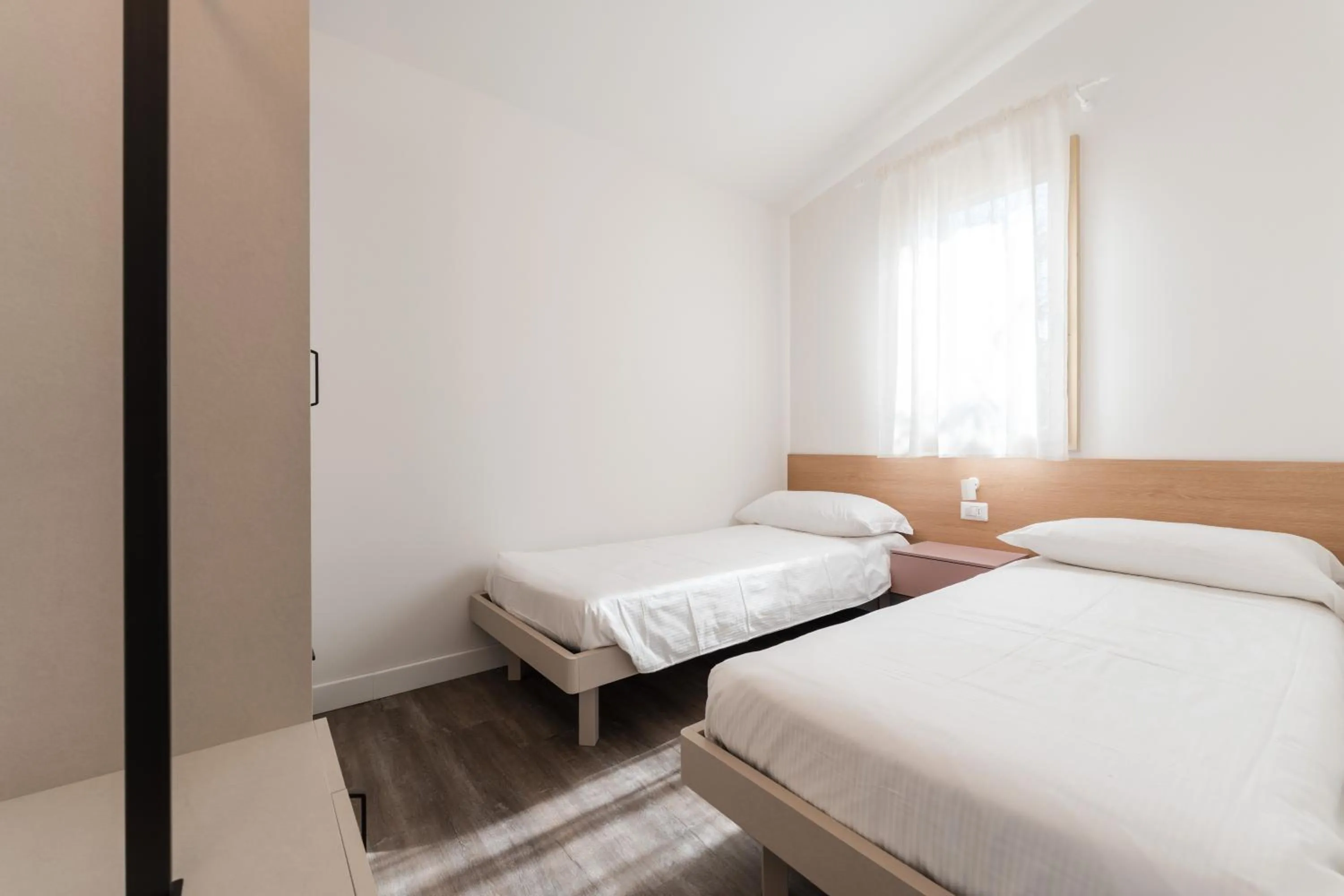 Bed in Natural Village Resort