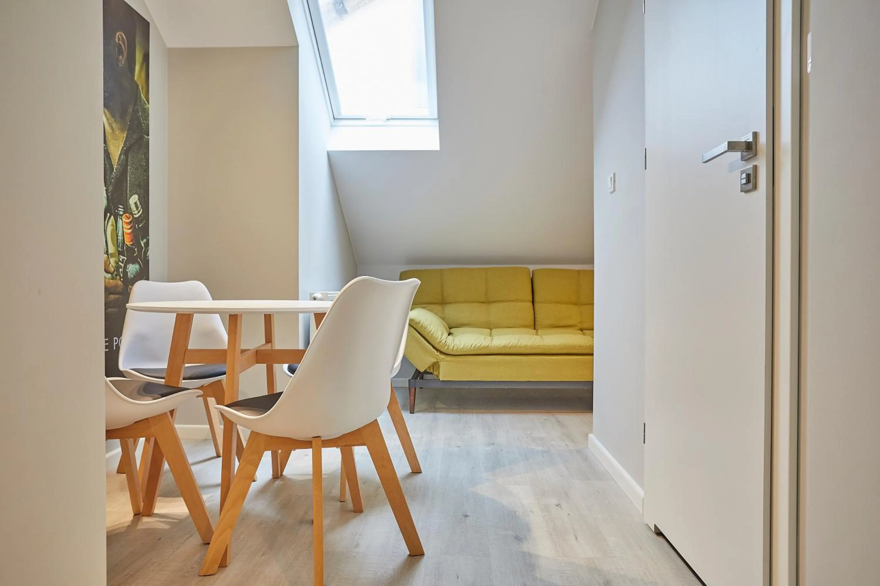 Seating area in FLORIANSKA 32 by PI Apartments