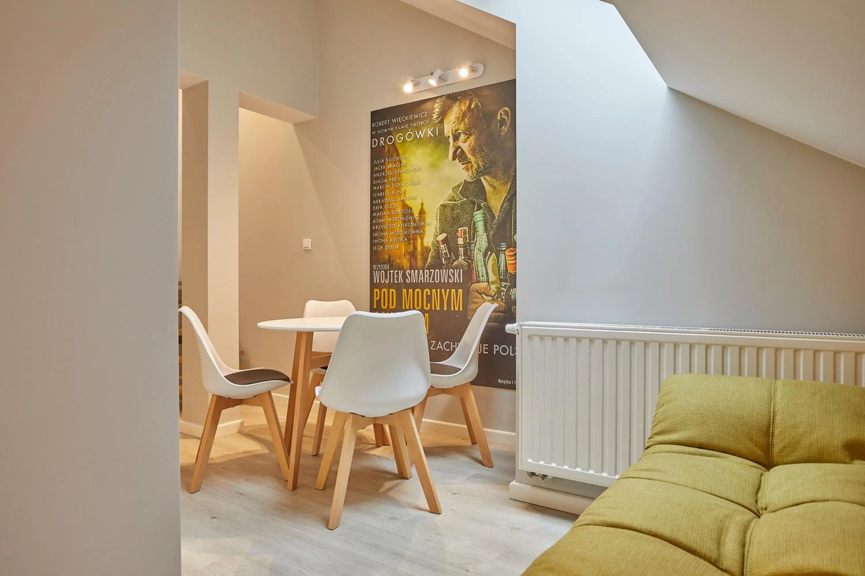 Dining area in FLORIANSKA 32 by PI Apartments