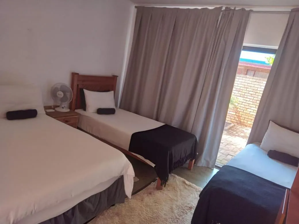 Bed in Woodpecker Guesthouse Middelburg Mpumalanga