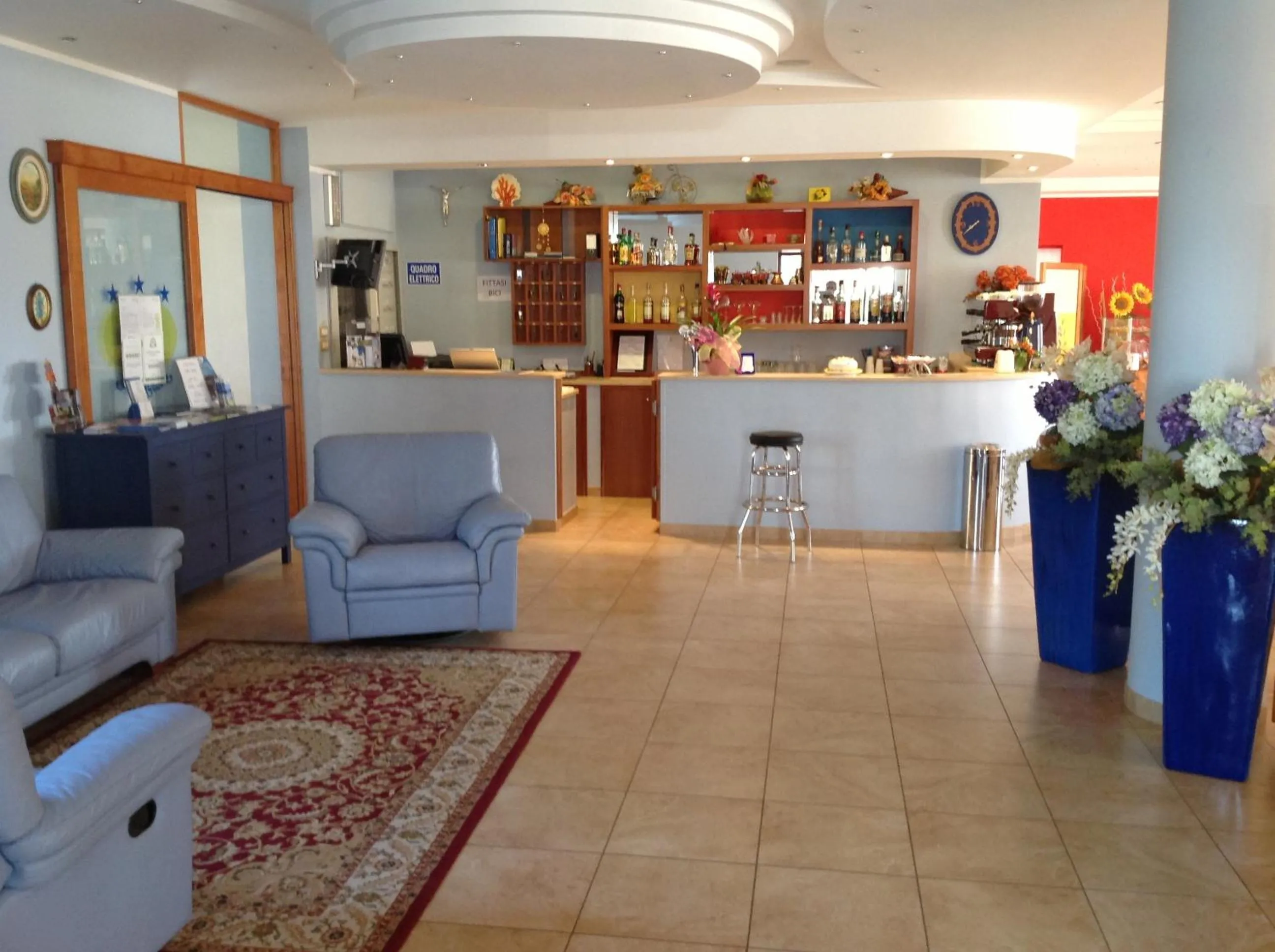 Communal lounge/ TV room in Hotel Corallo