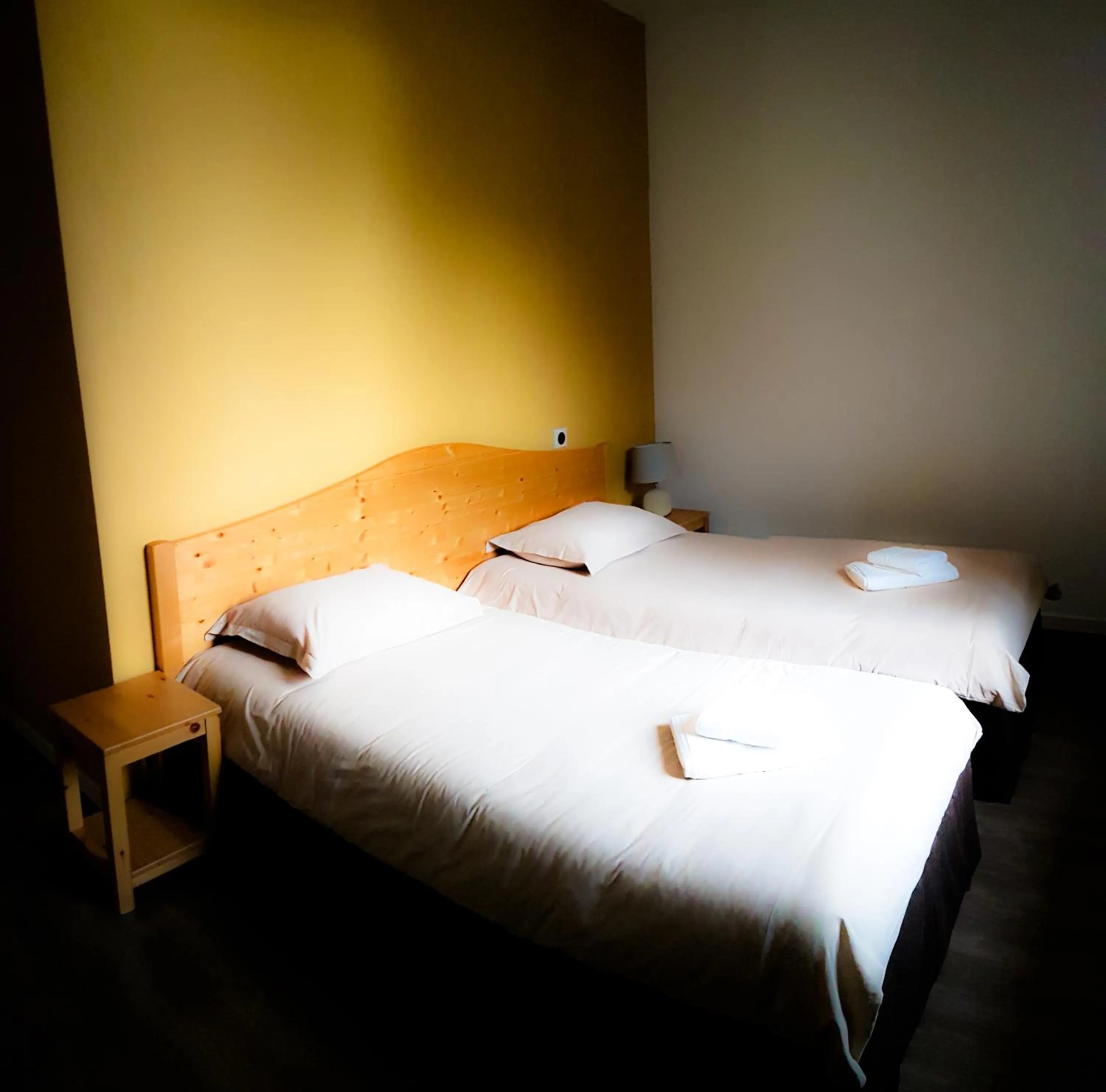 Bed in Hôtel du Soleil