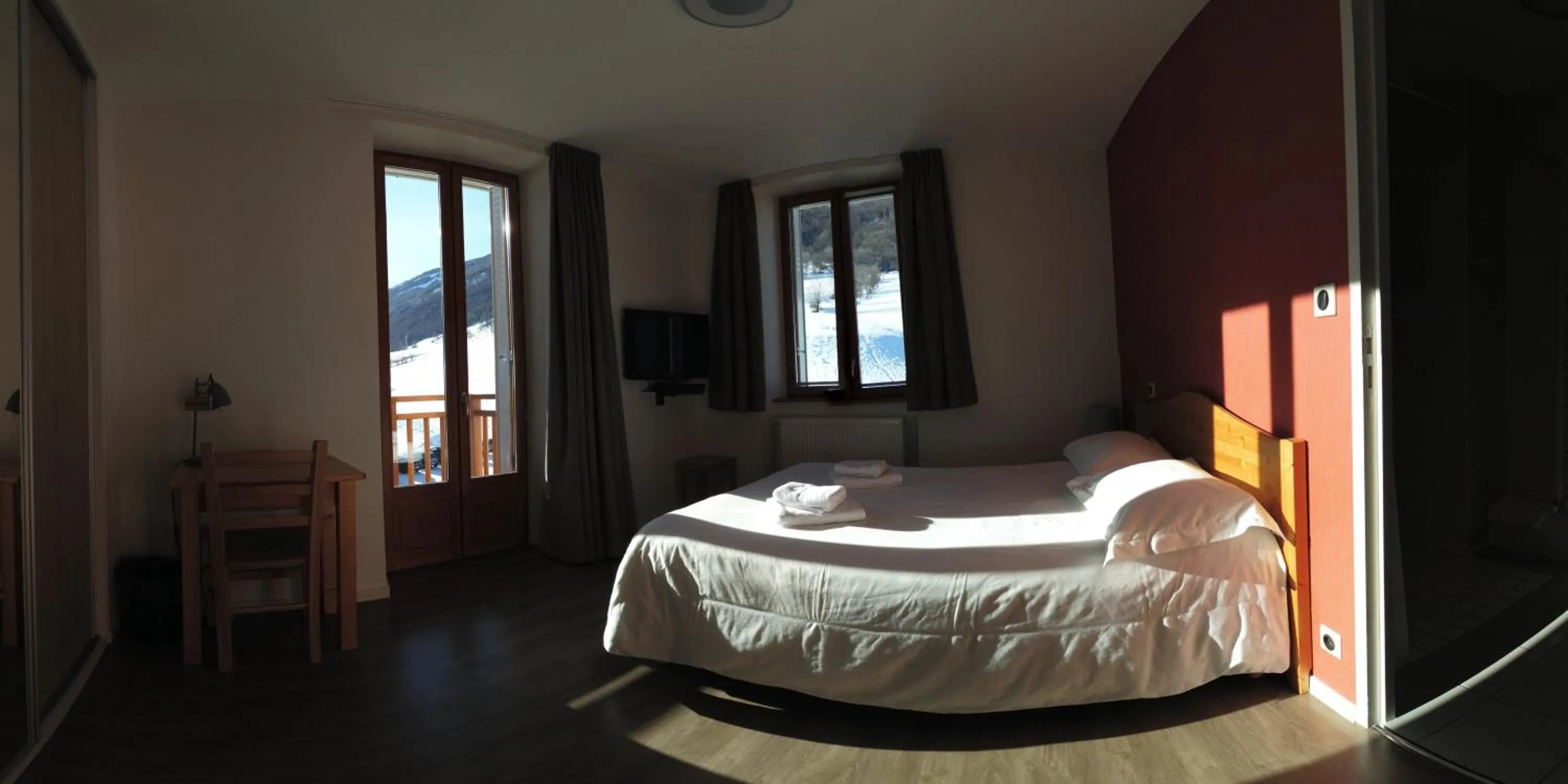 Bed in Hôtel du Soleil