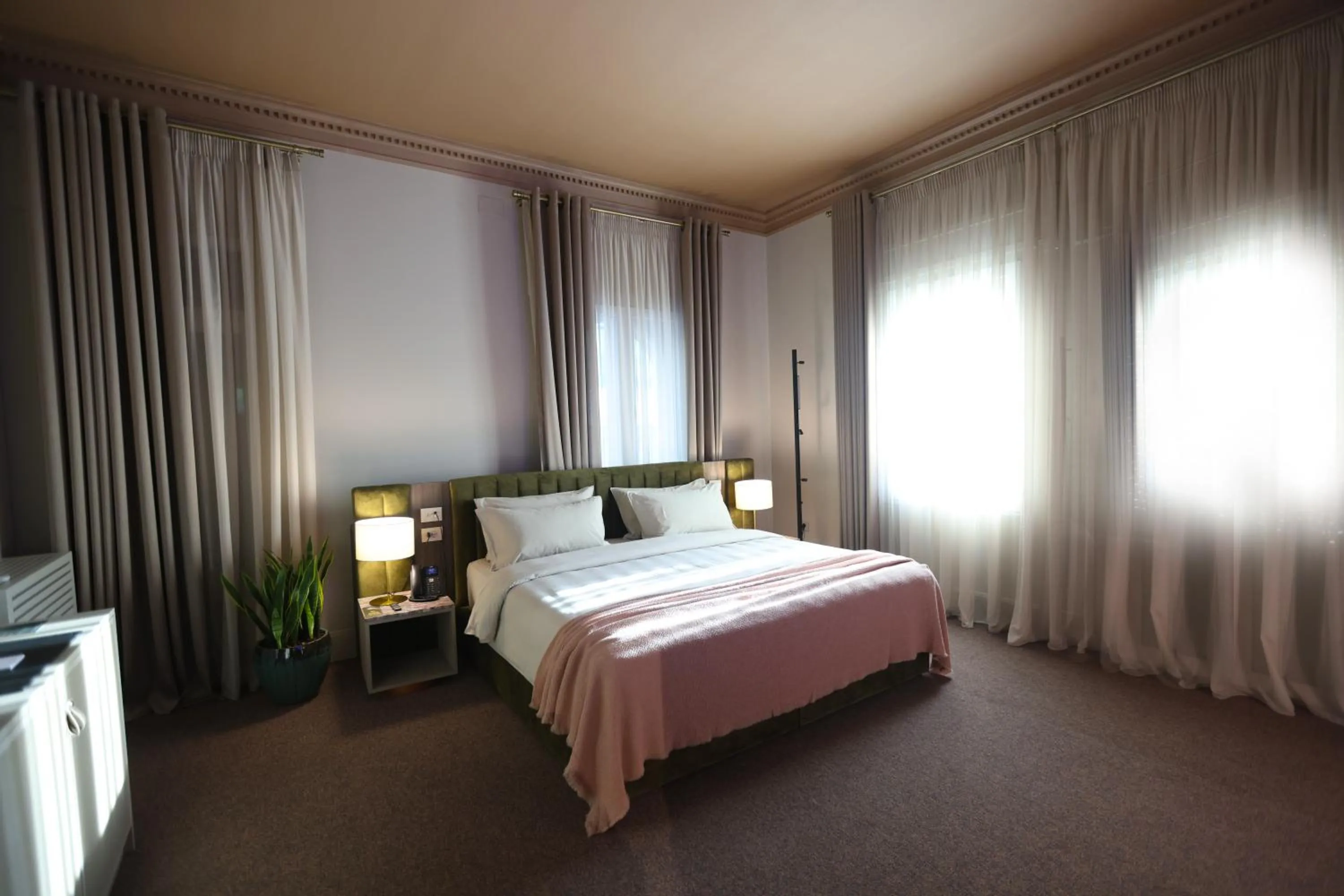 Bed in Padam Boutique Hotel