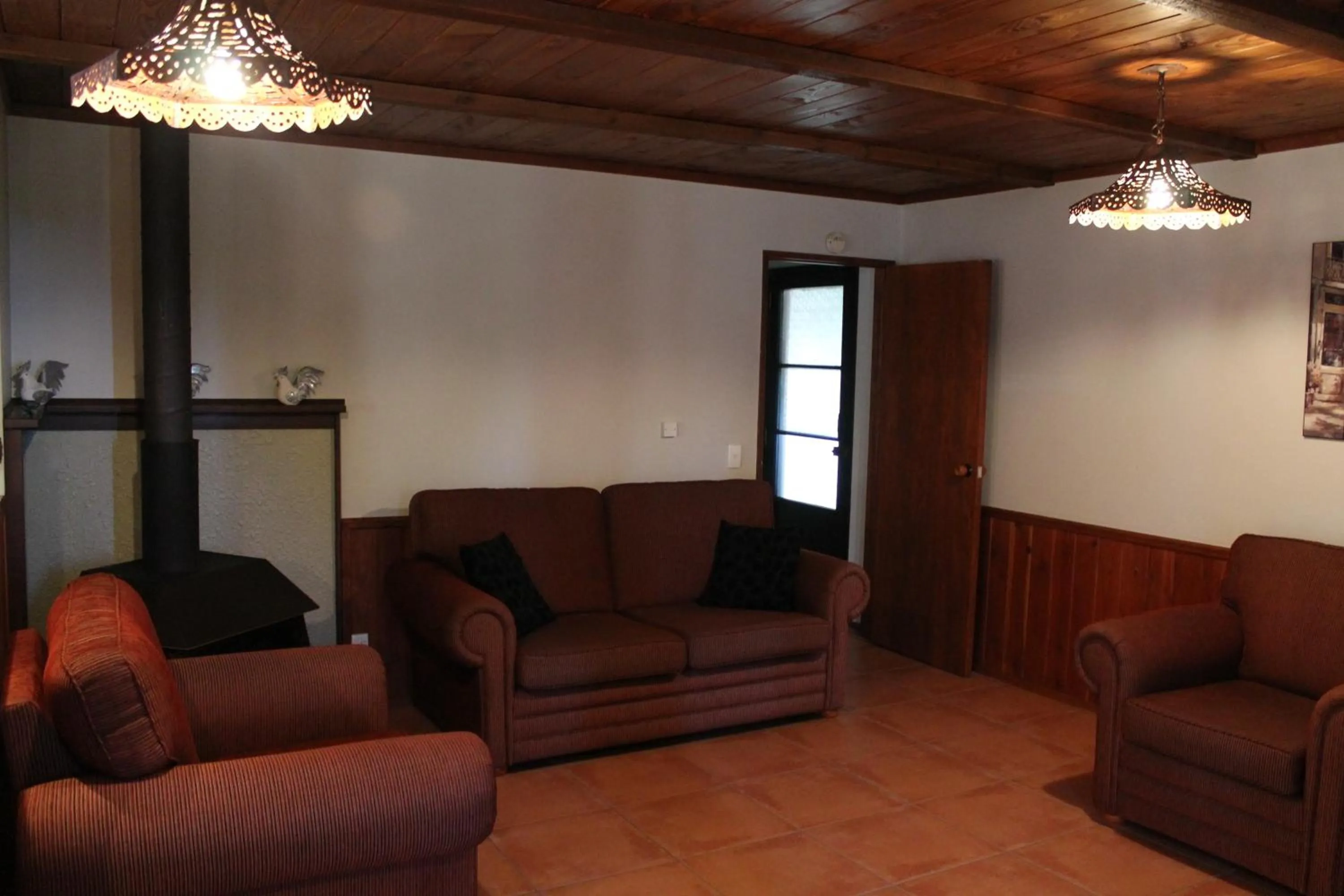 Communal lounge/ TV room in Chartré Manor B&B