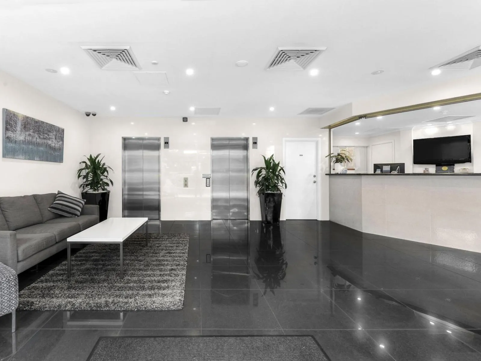 Lobby or reception in Central Brunswick Apartment Hotel