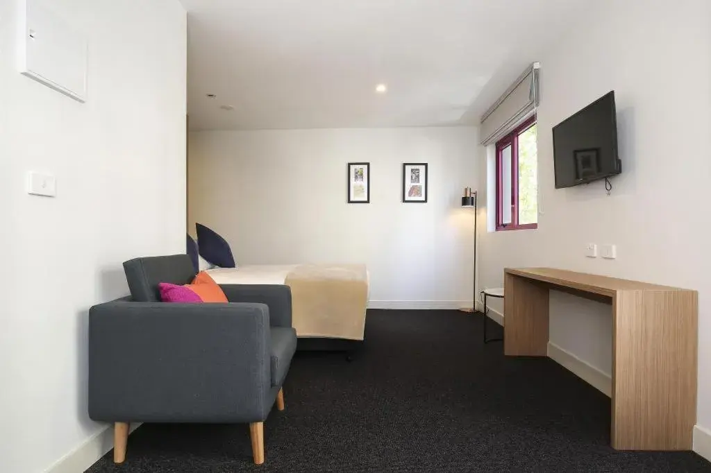 Deluxe Suite in Plum Serviced Apartments Carlton Deluxe Suite in Plum Serviced Apartments Carlton