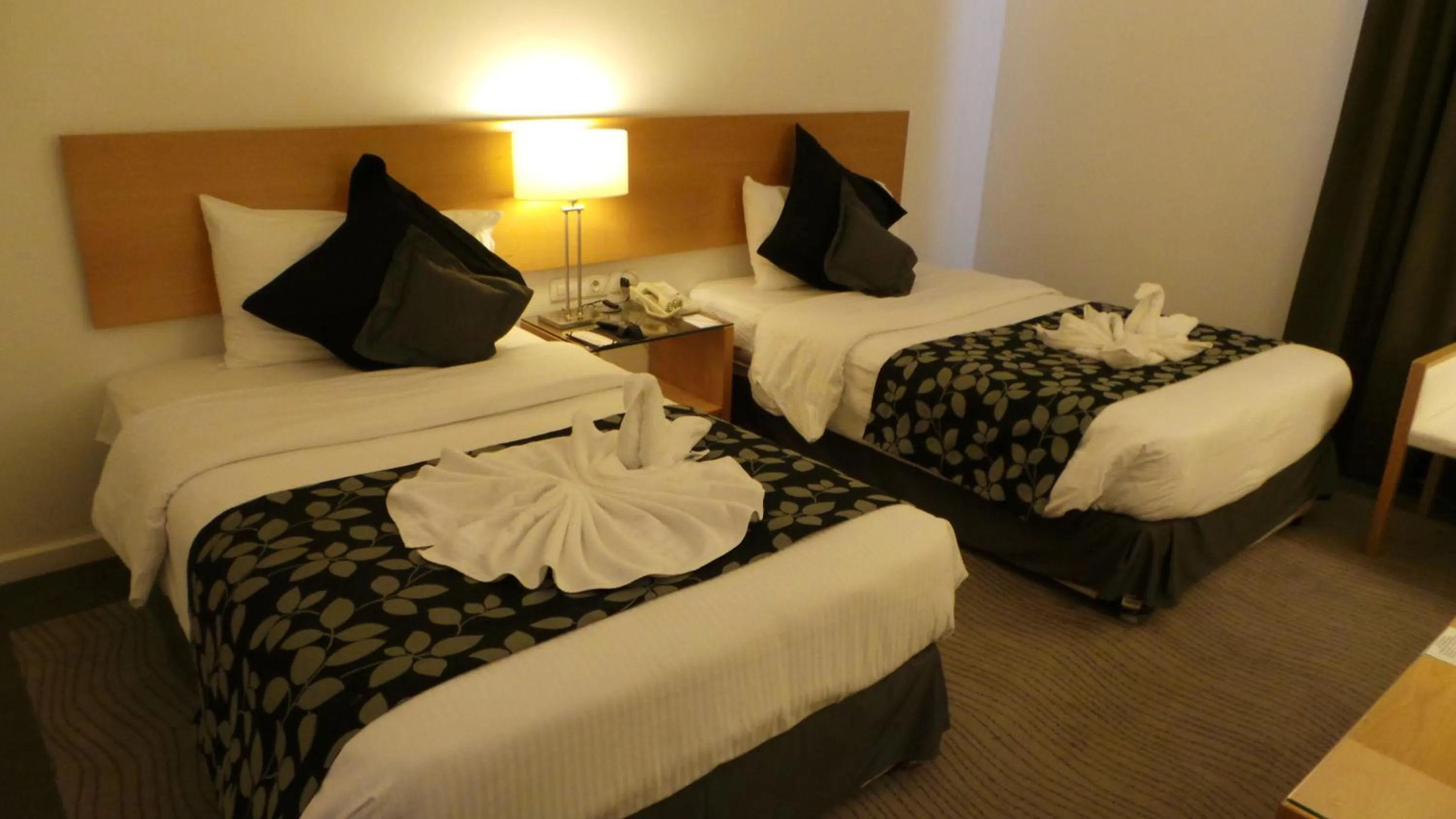 Bed in Amman Airport Hotel