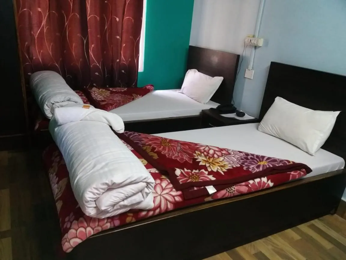 Bed in Buddha Hotel