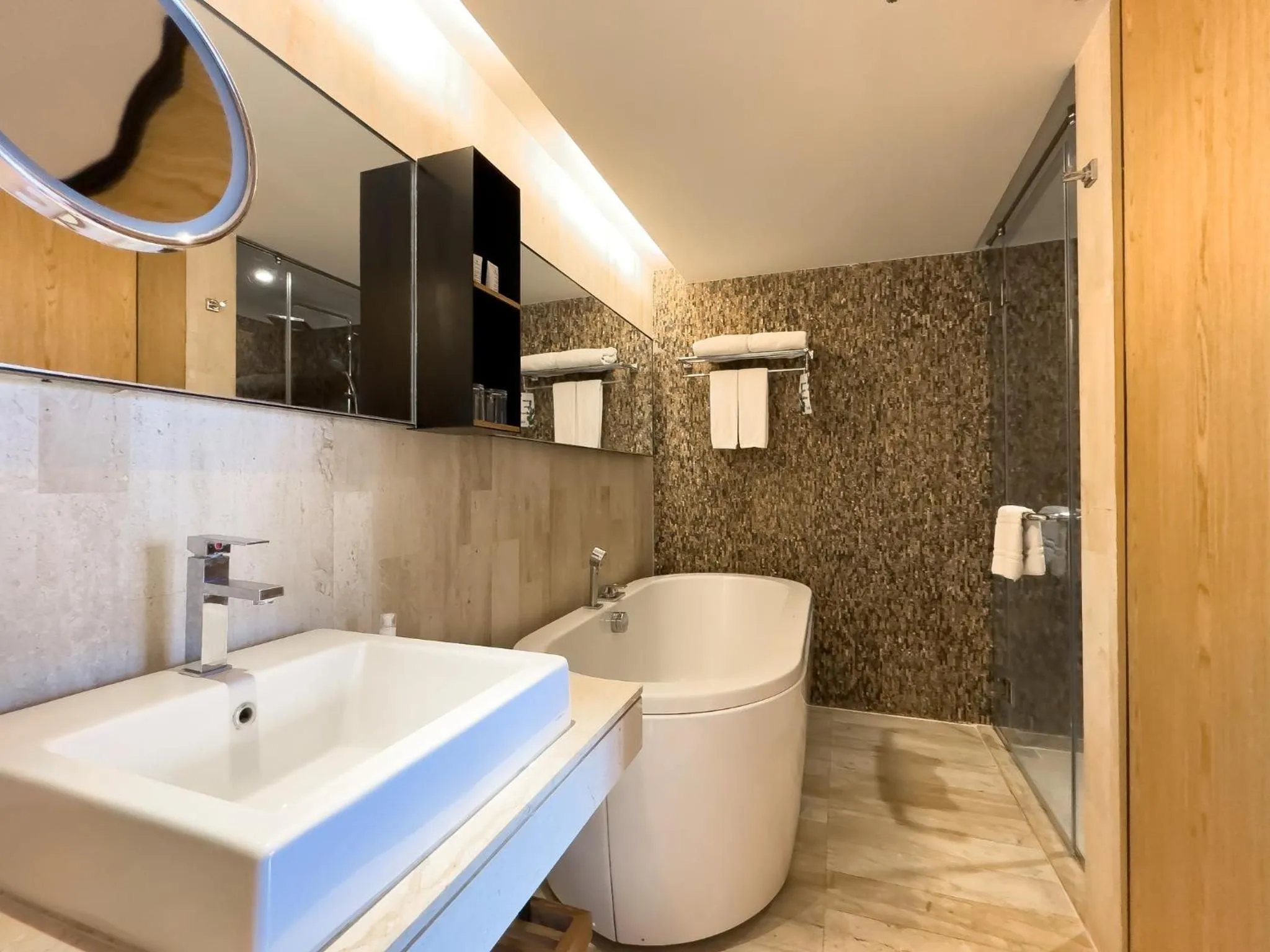 Toilet in Arcadia Suites Bangkok