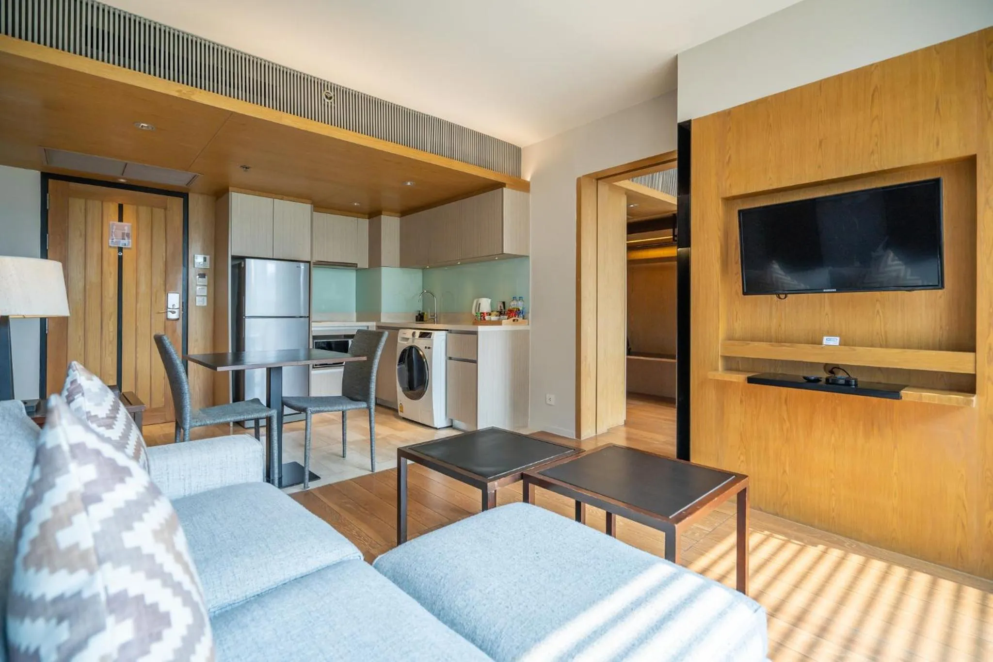 Seating area in Arcadia Suites Bangkok