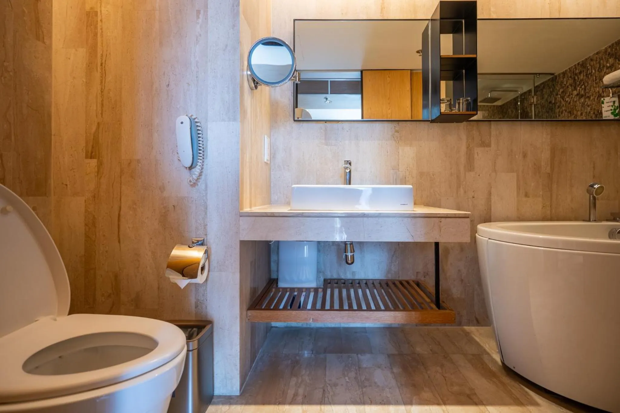 Bathroom in Arcadia Suites Bangkok