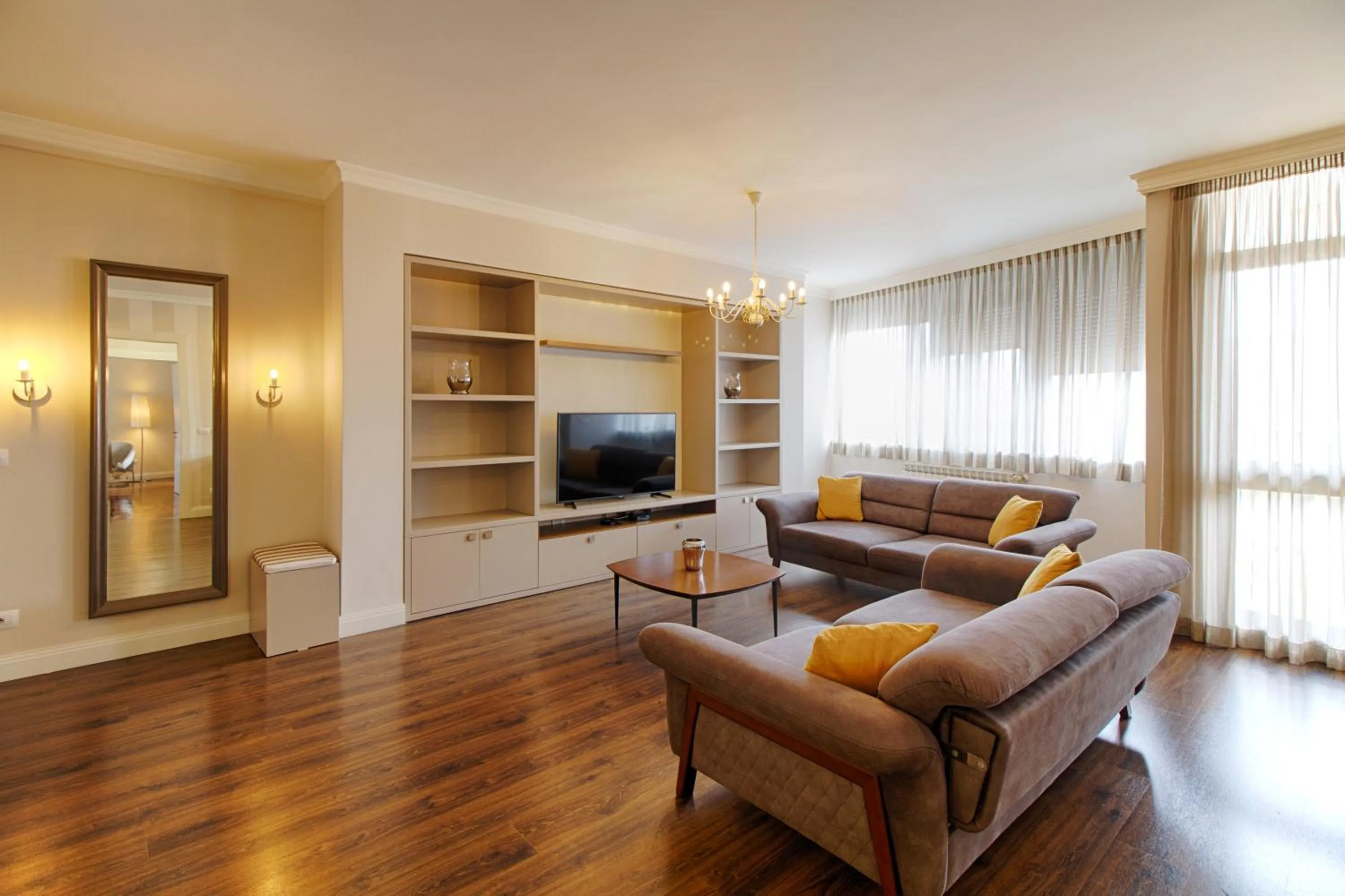 TV and multimedia in The Rooms Serviced Apartments Tirana