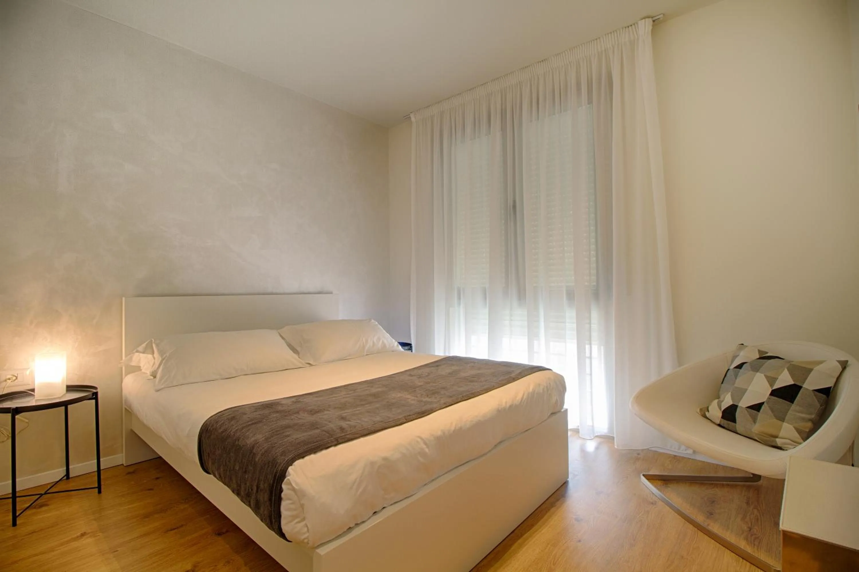 People, Bed in The Rooms Serviced Apartments Tirana