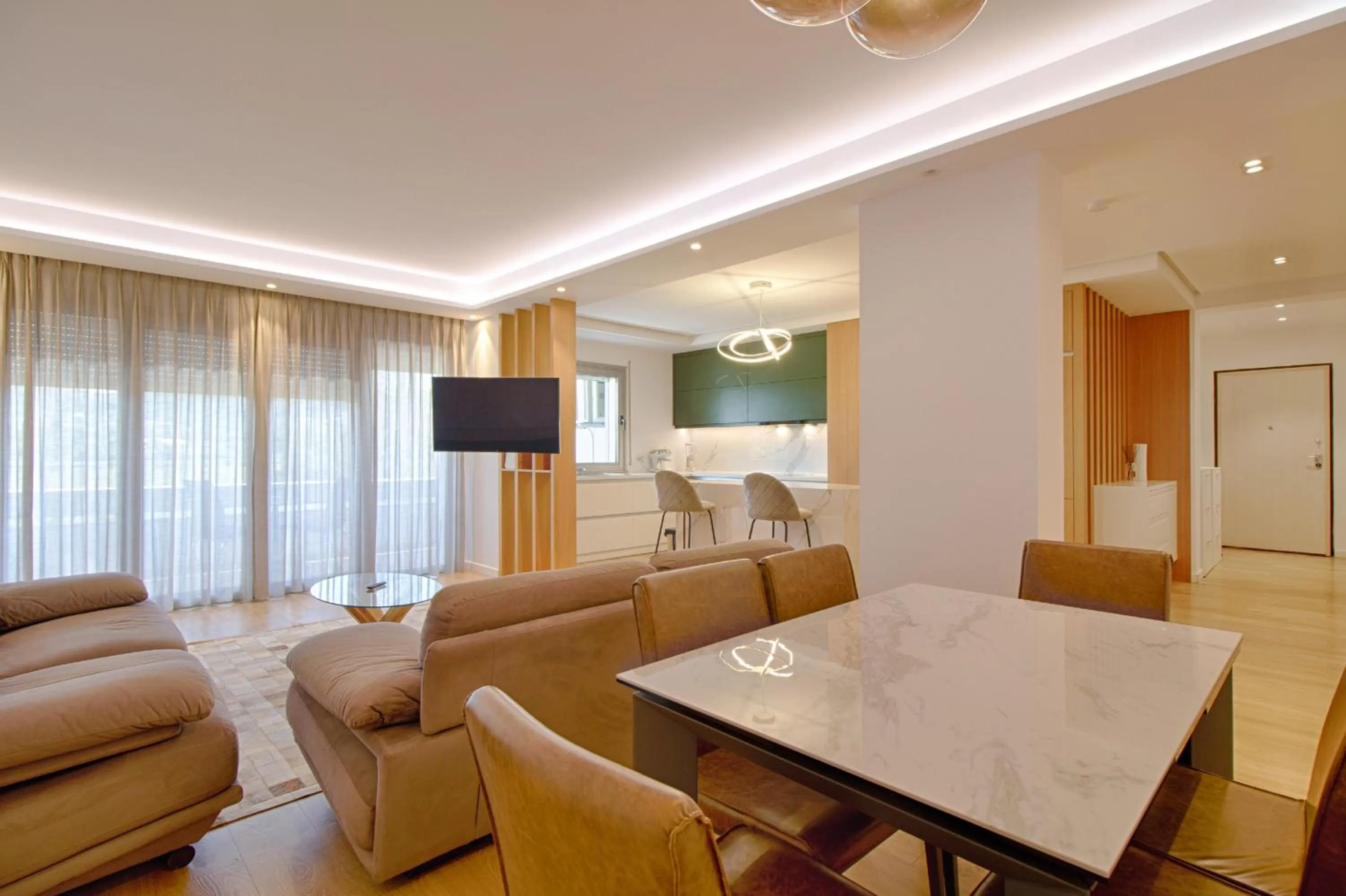 TV and multimedia in The Rooms Serviced Apartments Tirana