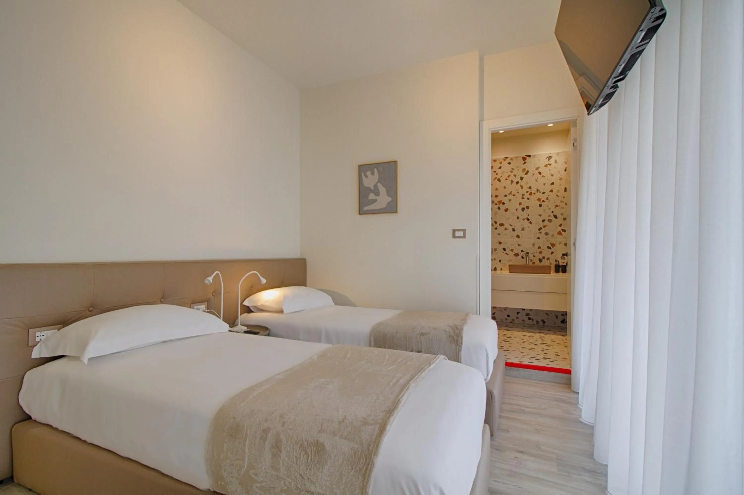 People, Bed in The Rooms Serviced Apartments Tirana