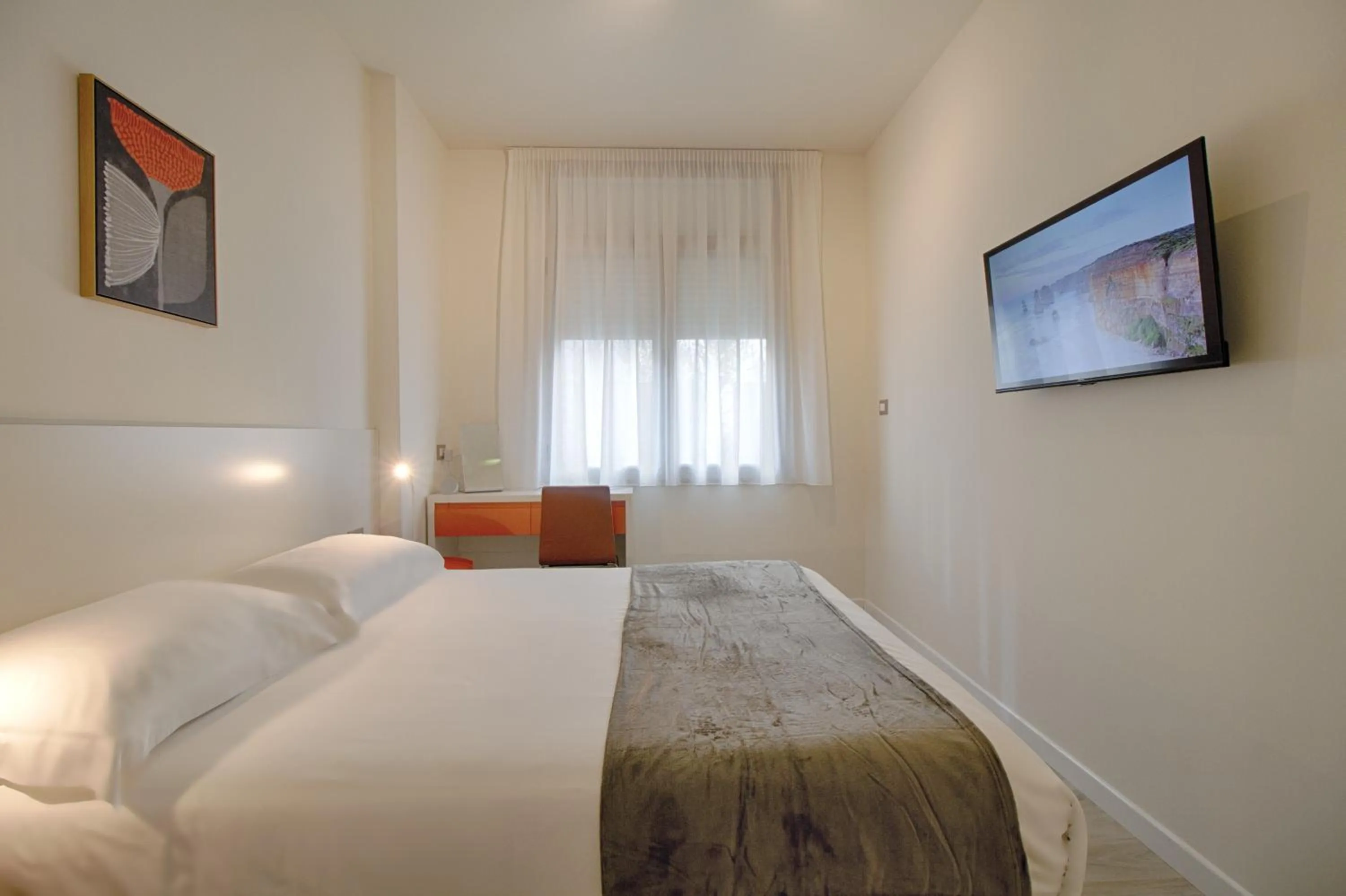 TV and multimedia, Bed in The Rooms Serviced Apartments Tirana