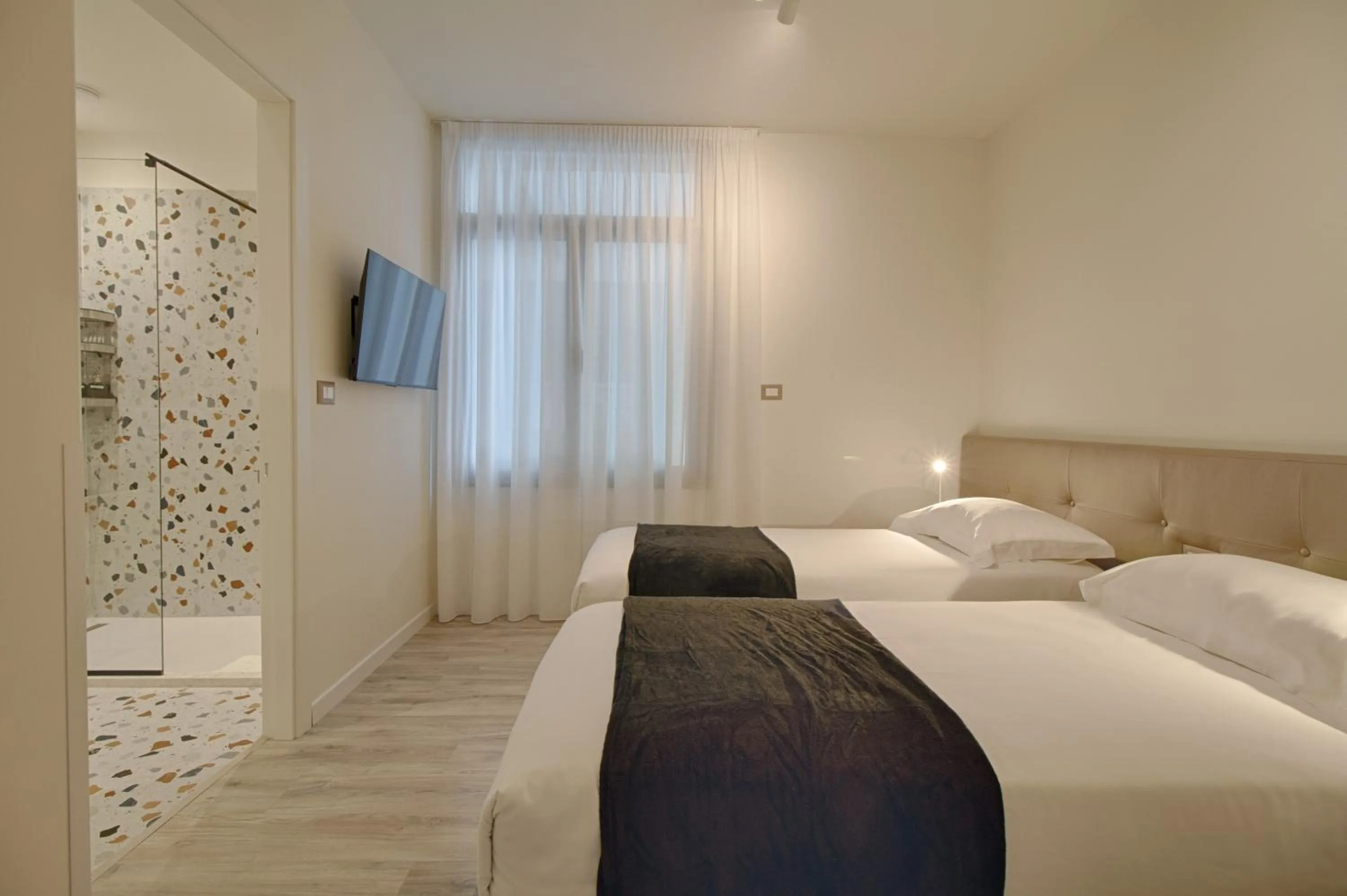 View (from property/room), Bed in The Rooms Serviced Apartments Tirana