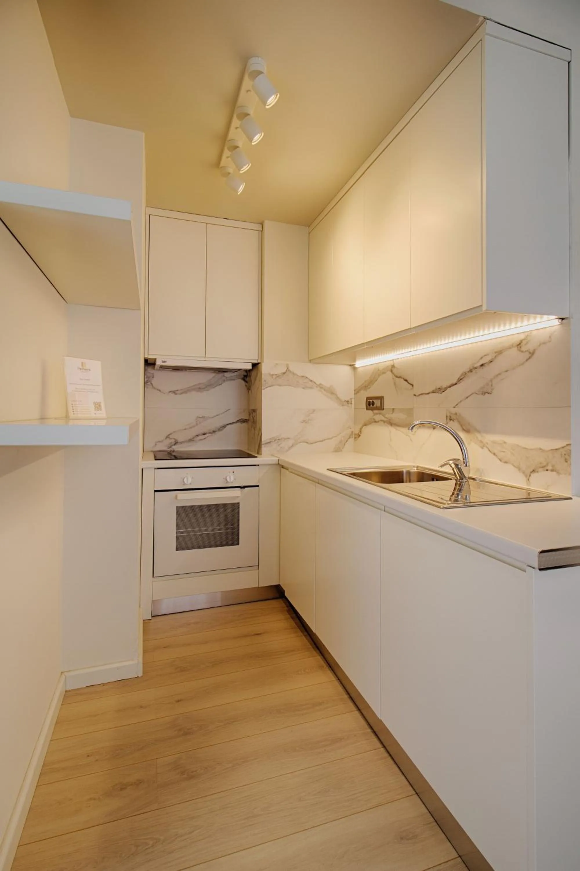 Kitchen or kitchenette in The Rooms Serviced Apartments Tirana